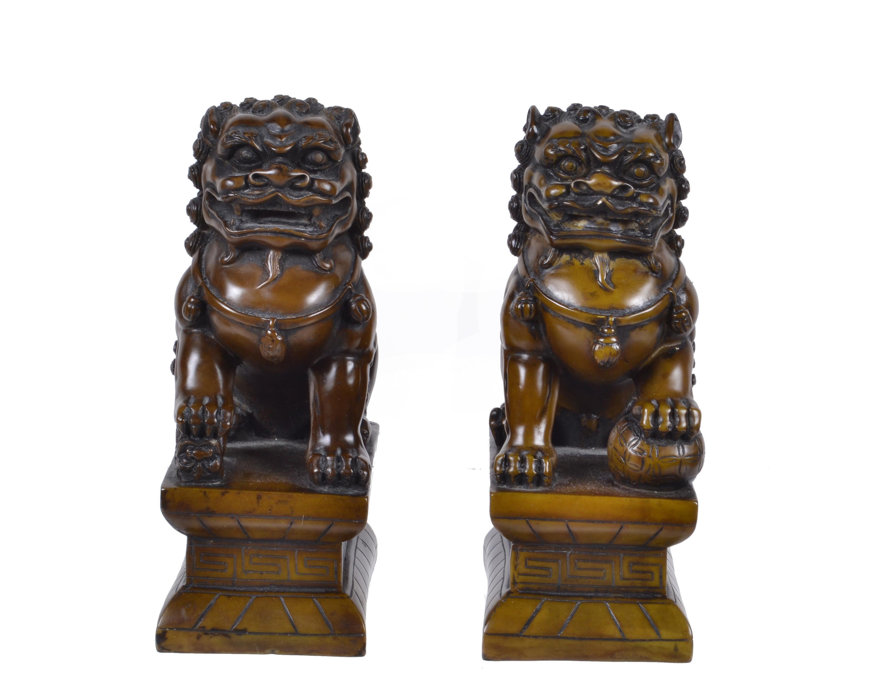 A pair of hand-carved solid wood foo dogs.
Can be used as bookends or as decoration.
Great collectors pieces.