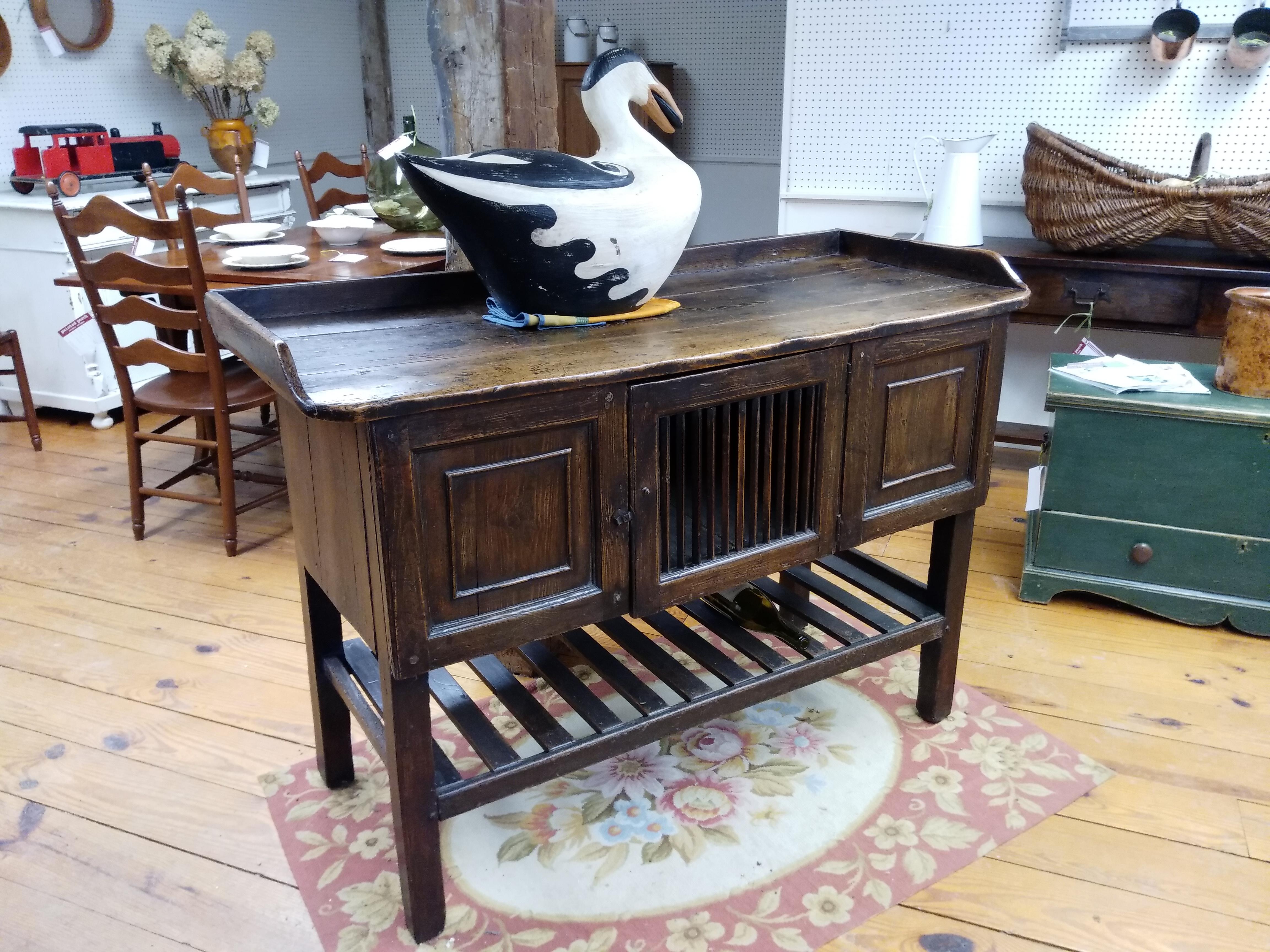 This piece is a total knockout. Dating from 1790, it came from a Scottish kitchen and was used for food storage. With great dimensions, this piece could be used against a wall or as a free standing island -- the rustic wooden back is gorgeous. A