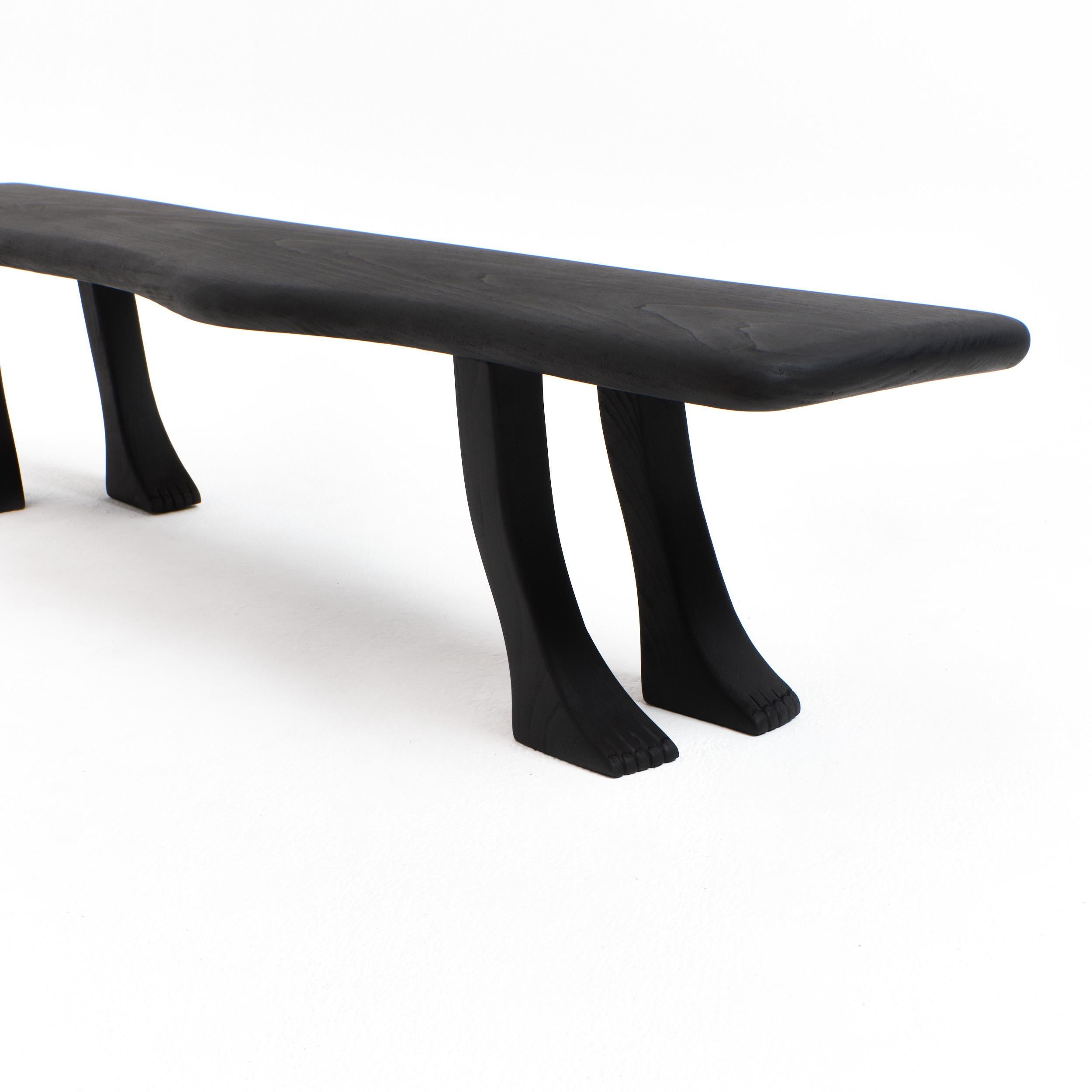 Hand-Carved Foot Bench in black For Sale