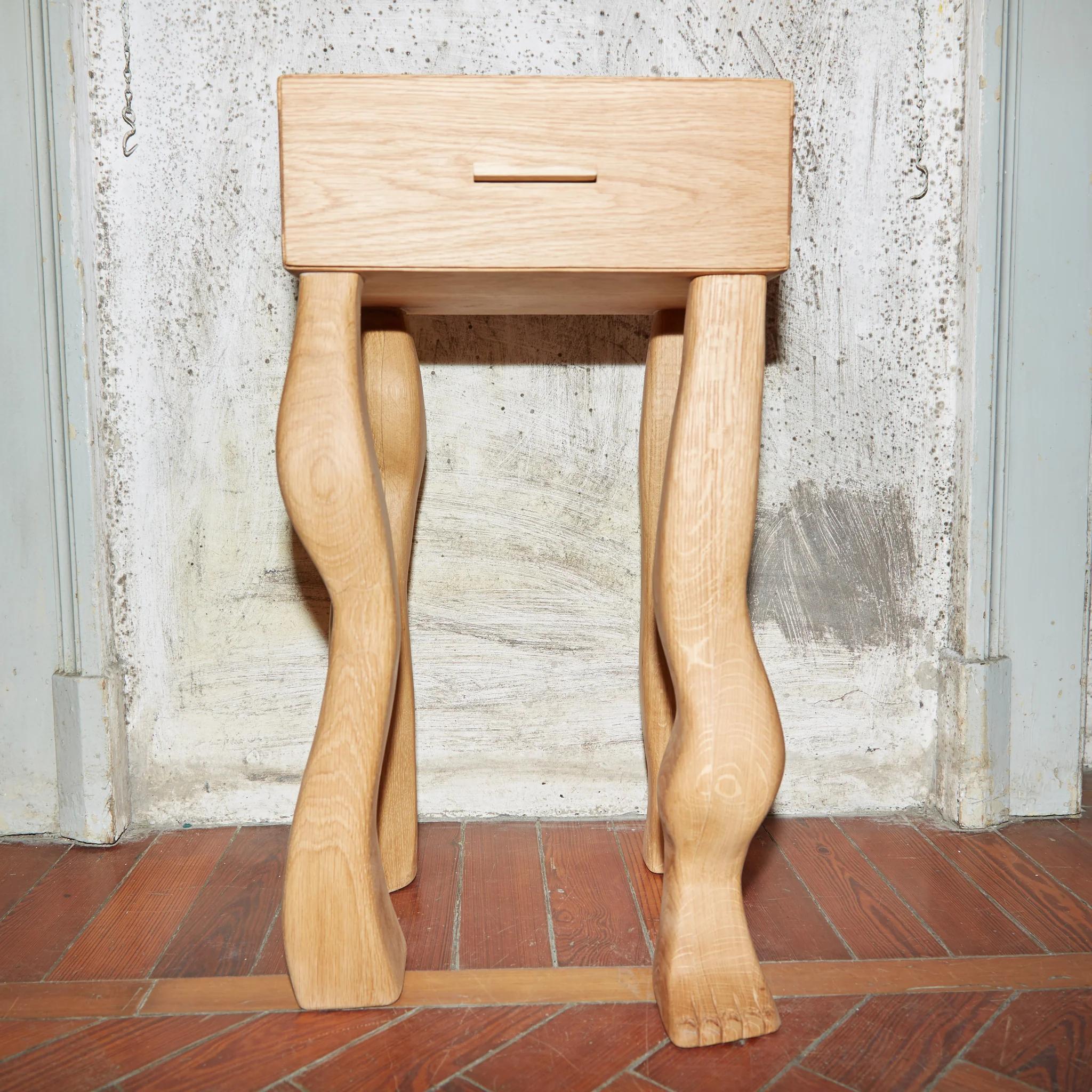 Foot Side Table With Drawer by Project 213A
Dimensions: W 32 x D 28 x H 62 cm
Materials: Oak

The Foot Side Table is made from Oak wood with carefully designed jointing details. The drawer stands on 4 irregular legs of which one has a foot. The