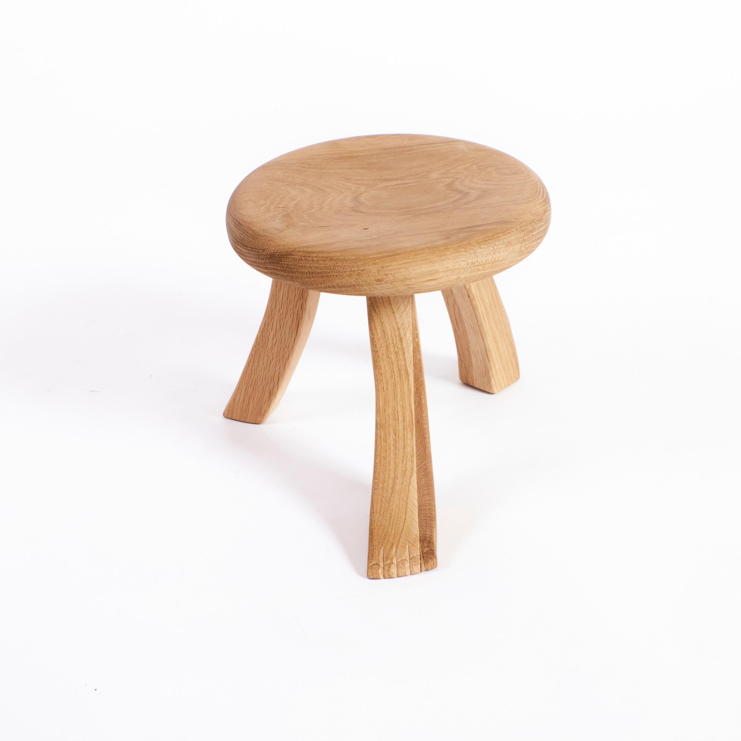 This playful design is inspired by a classic milking stool, and has a fun twist with three individually shaped legs. The stool is hand carved by artisans in northern Portugal from chestnut wood and oil finished to have a rich dark brown
