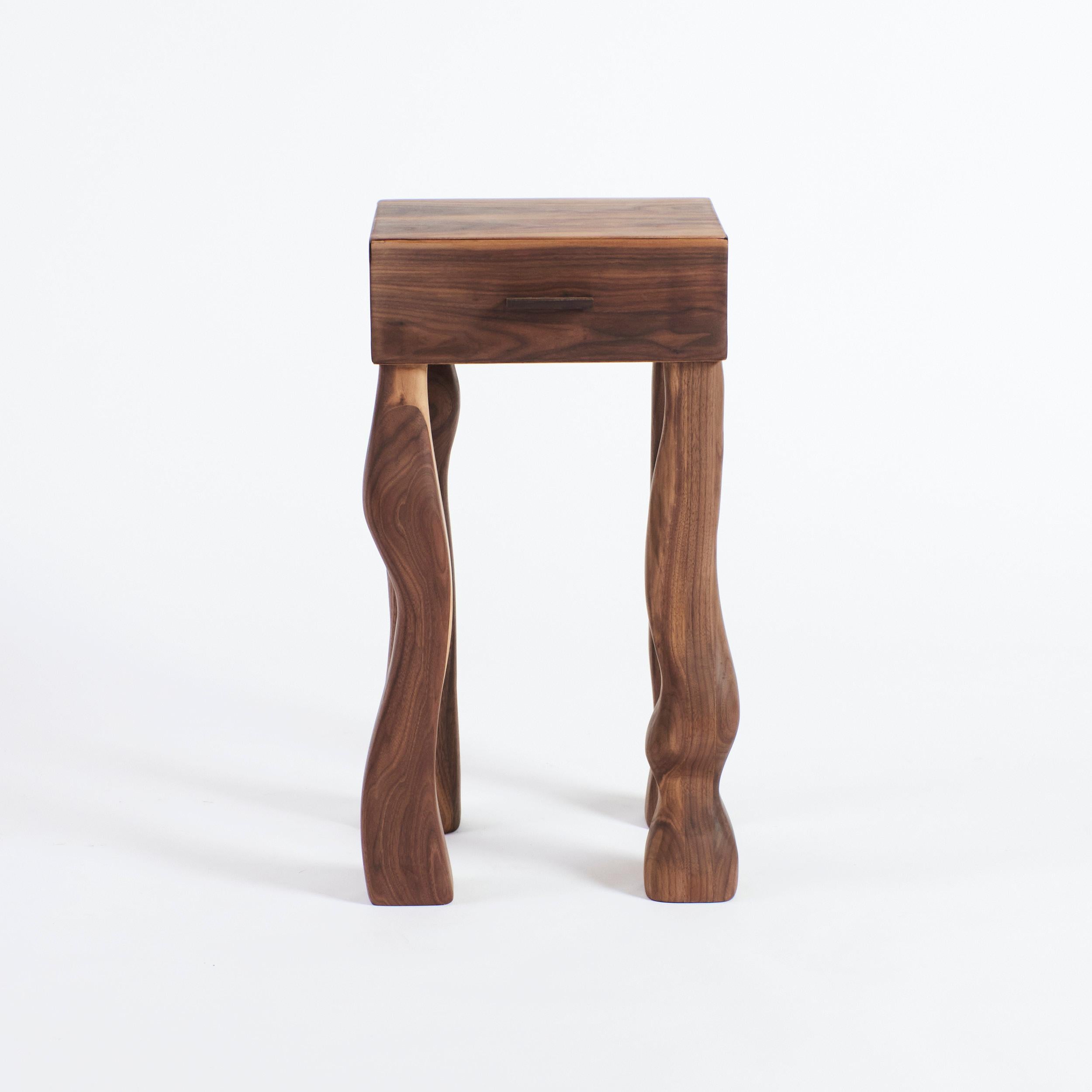 Foot Side Table With Drawer by Project 213A
Dimensions: W 32 x D 28 x H 62 cm
Materials: Walnut

The Foot Side Table is made from Oak wood with carefully designed jointing details. The drawer stands on 4 irregular legs of which one has a foot. The