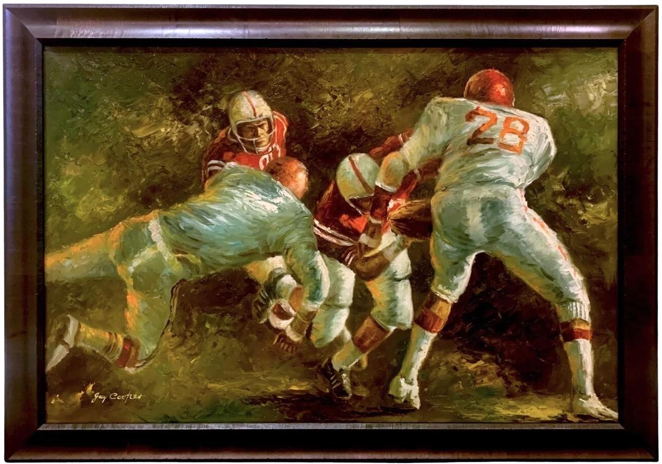Presented is an original oil-on-canvas painting of a football game by American artist Jay Cooper. In the composition, two football players, donned in red jerseys, run the ball against a the opposing side, in white. An abstract background of dark