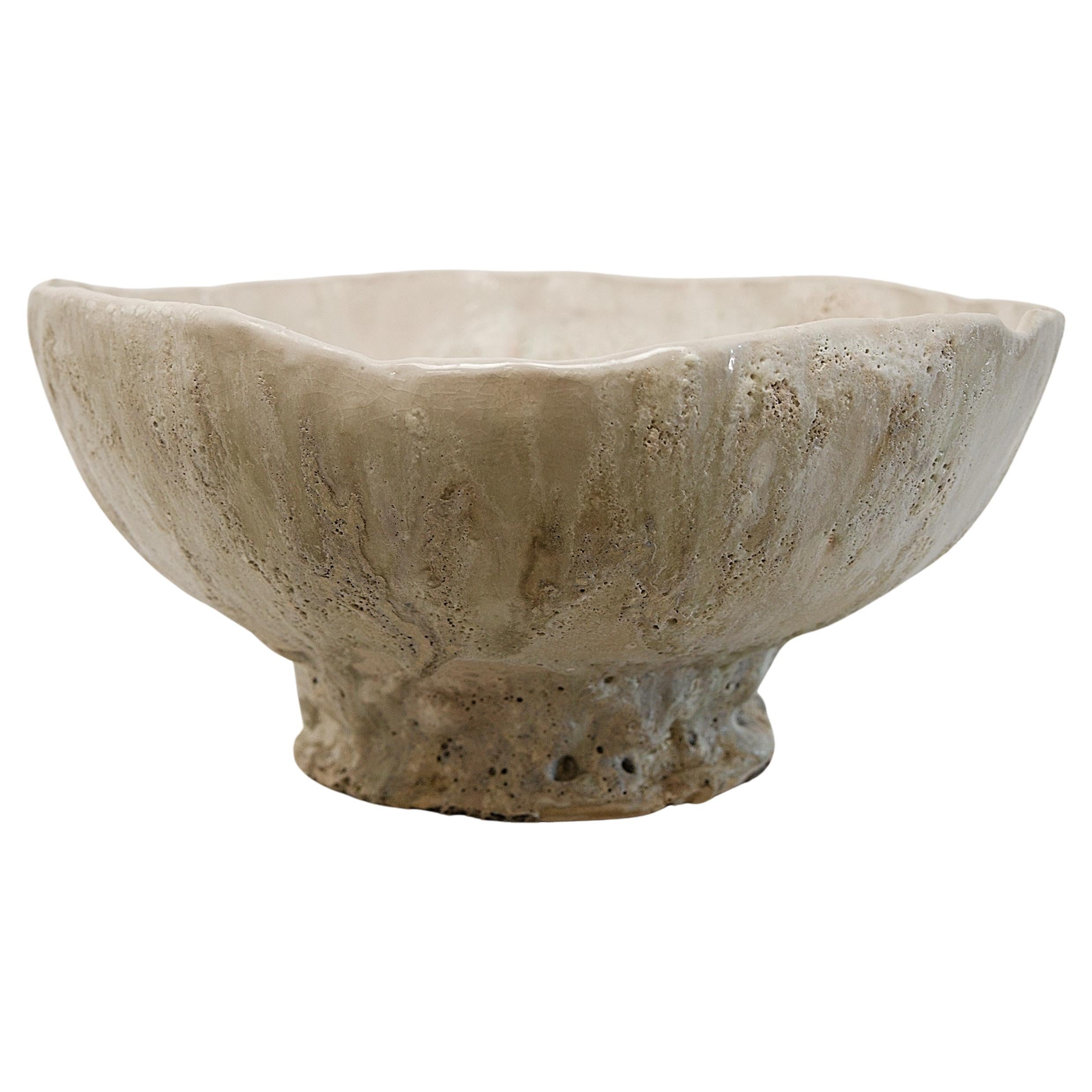 Discover the Relics Large Low Stoneware Planter Bowl, the perfect large sized bowl to use as a planter for orchids or other succulents on your table. This exquisite piece is handcrafted from stoneware clay and adorned with a crackle matte off-white