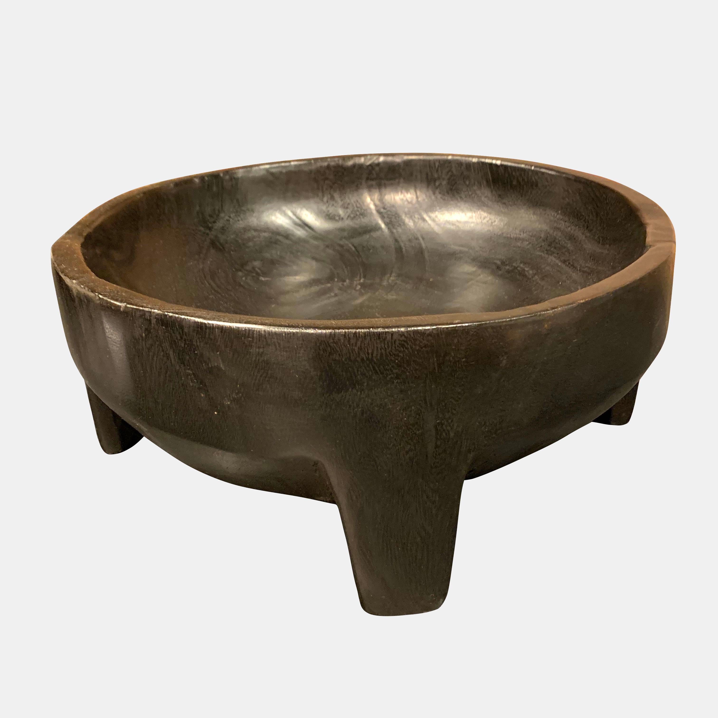 Contemporary Indonesian ebonized lychee wood footed bowl
Decorative and functional.
     