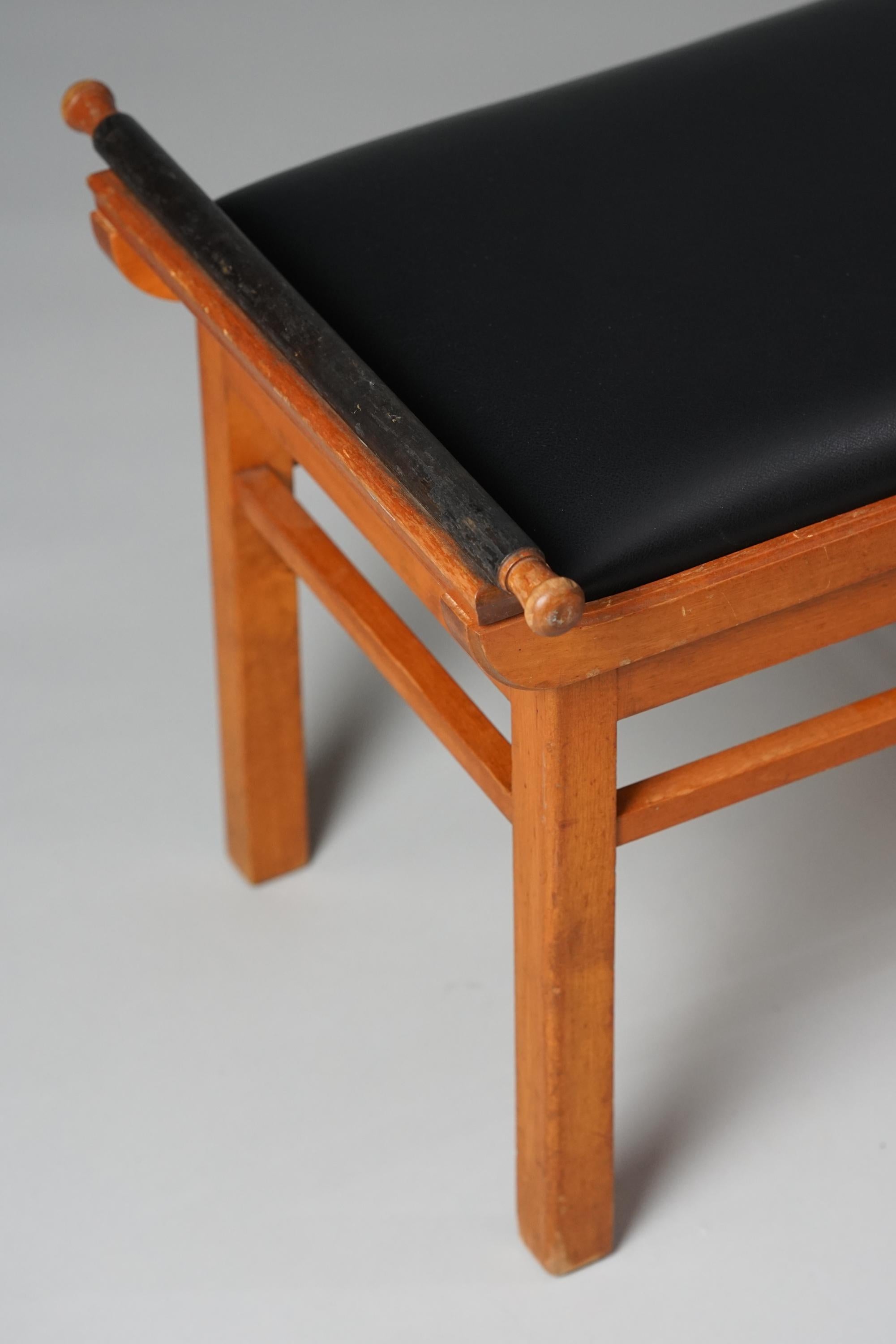 Footstool, attributed to Birger Hahl, early 20th century. Birch frame with reupholstered leather seating. Good vintage condition, minor patina consistent with age and use. 
