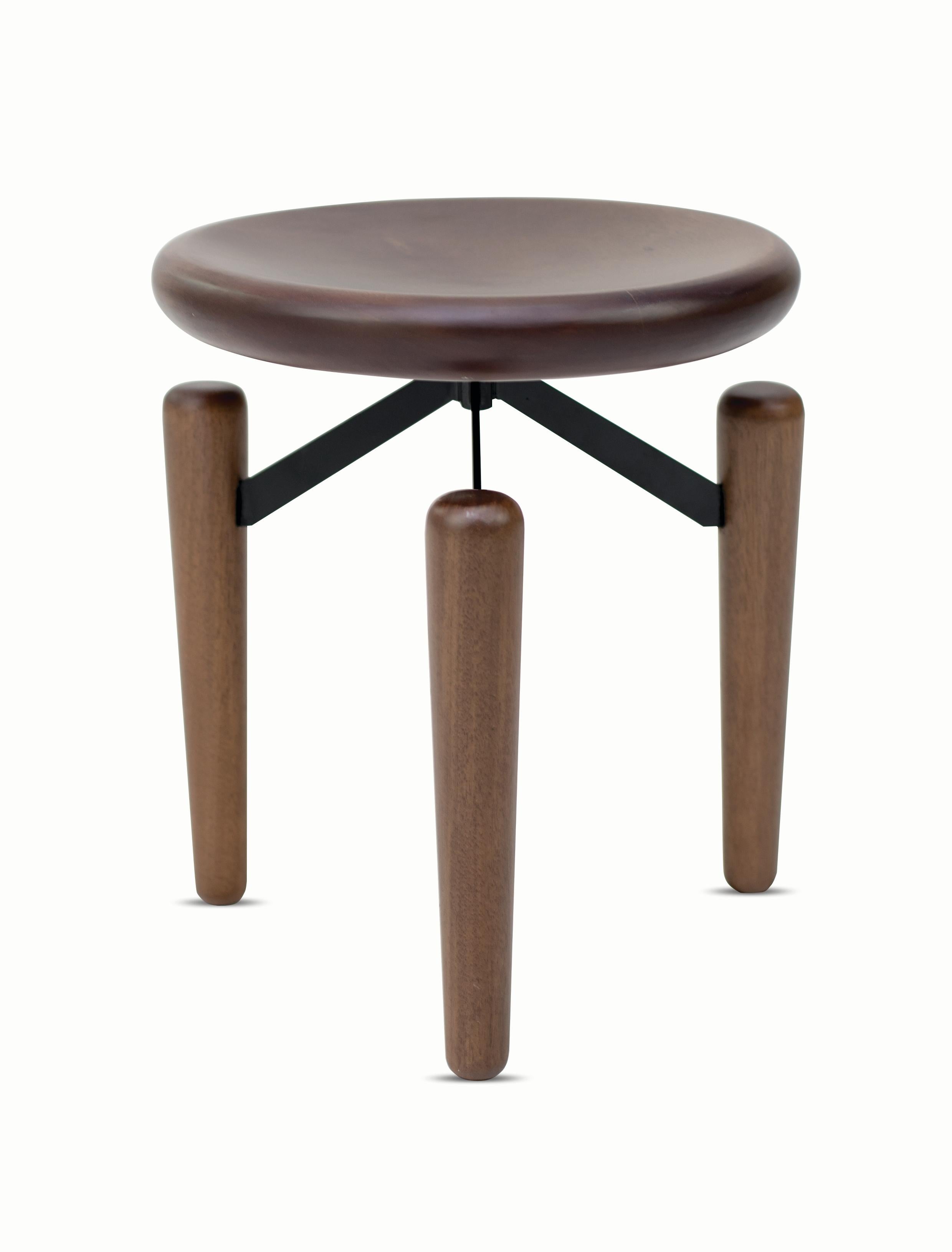 The Tripod footstool is a versatile piece for your home.
The Tripod Stool brings a laid-back and at the same time innovative look, ideal for relaxing environments with family or friends. 

Item Details:
Wood: Ebonized
Metal Structure: Black

NOTE: