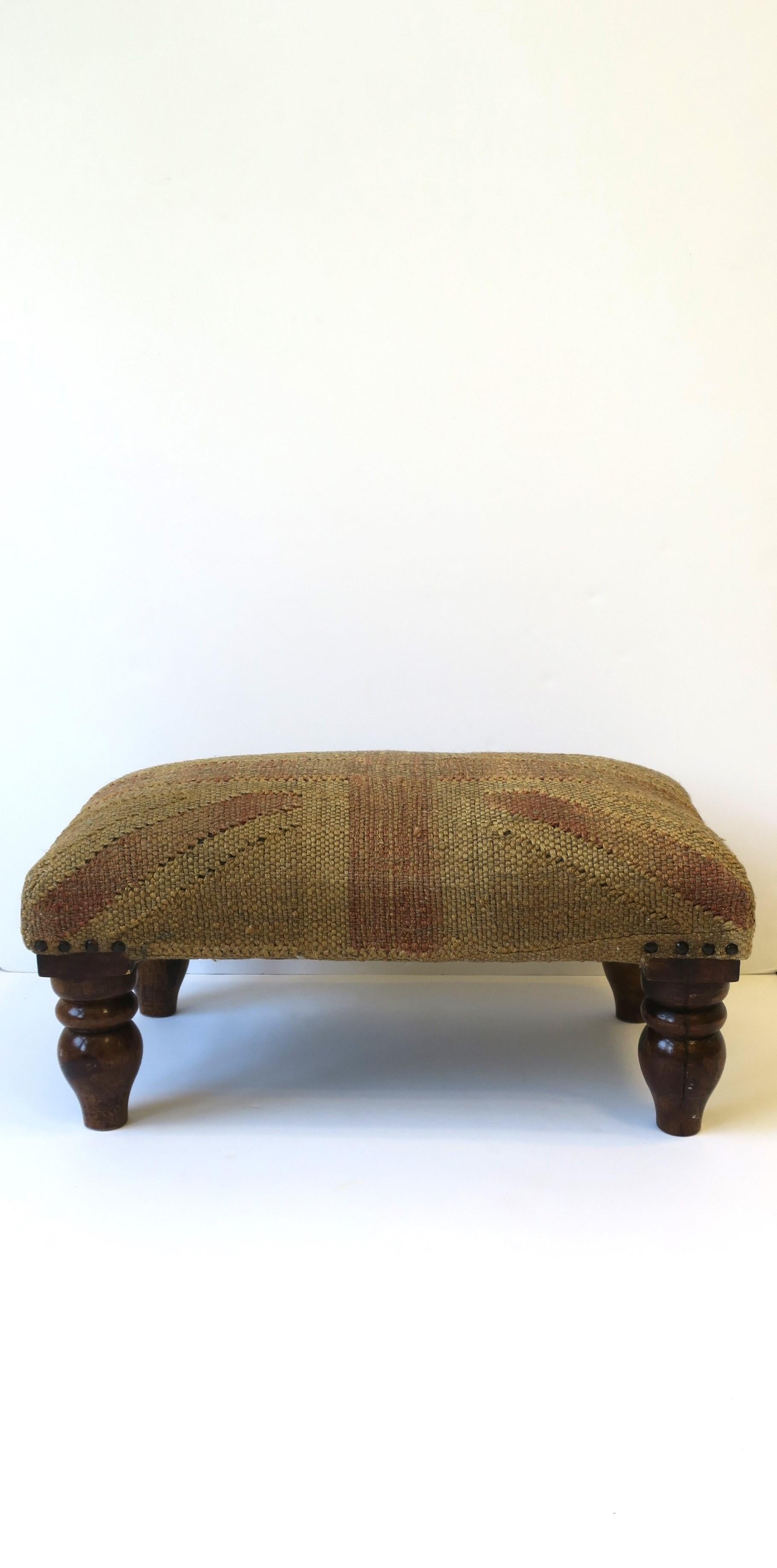A rectangular footstool or low seat stool bench with British Union Jack flag design, circa late-20th century. Stool is a great size, not too big or too small. Great as a footstool or a low stool seat bench. Piece can also hold a drink providing