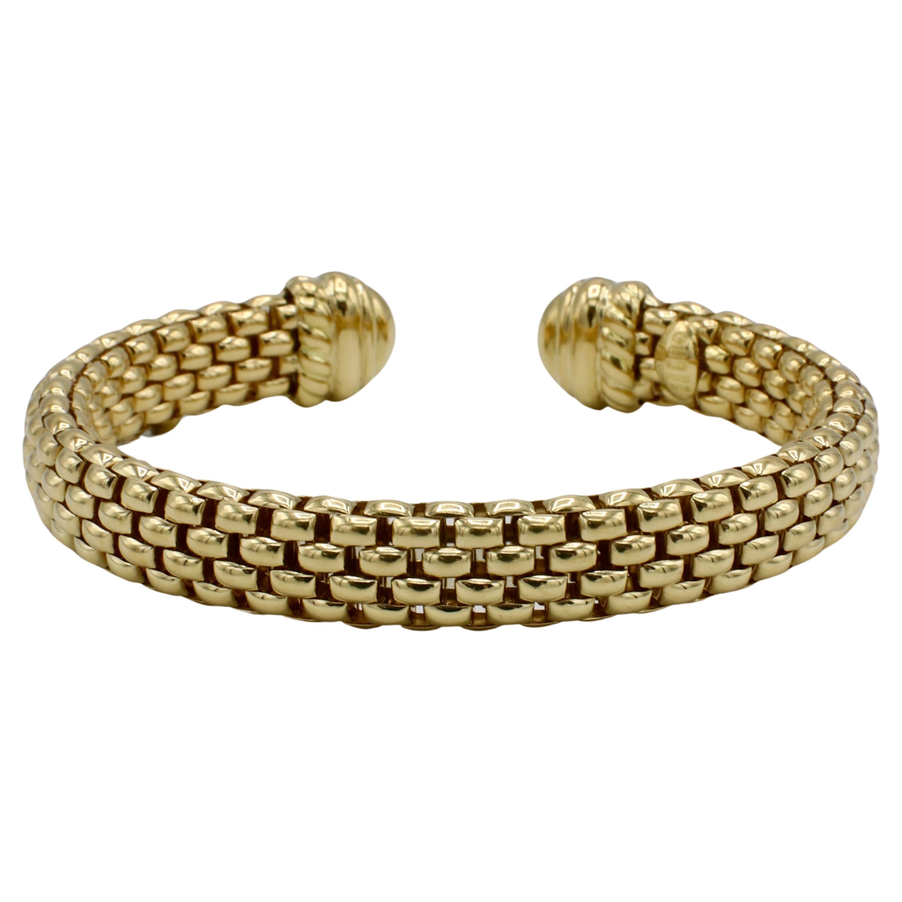 Fope 18 Karat Yellow Gold Woven Cuff Bracelet 
Metal: 18k yellow gold
Weight: 34.7 grams
Circumference: 6.5 inches (flexible)
Width: 9.5mm
