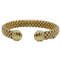 Gewebtes Manschettenarmband aus 18 Karat Gelbgold mit Fope 