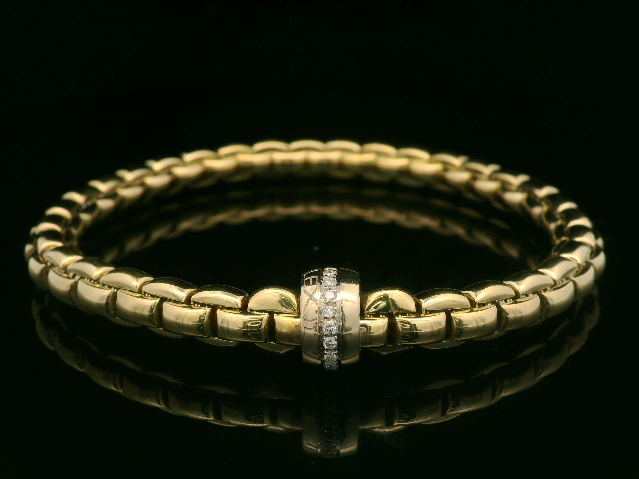 --Stone(s):--
Numerous Natural Genuine Diamond - Round Brilliant Cut - Pave Set - White Color - 0.15ctw (approx.)

Material: Solid 18k Yellow Gold
Weight: 23.91 Grams
Chain Type: Rondell Link
Chain Length: Due to Its Flexibility Will fit up to 7.5