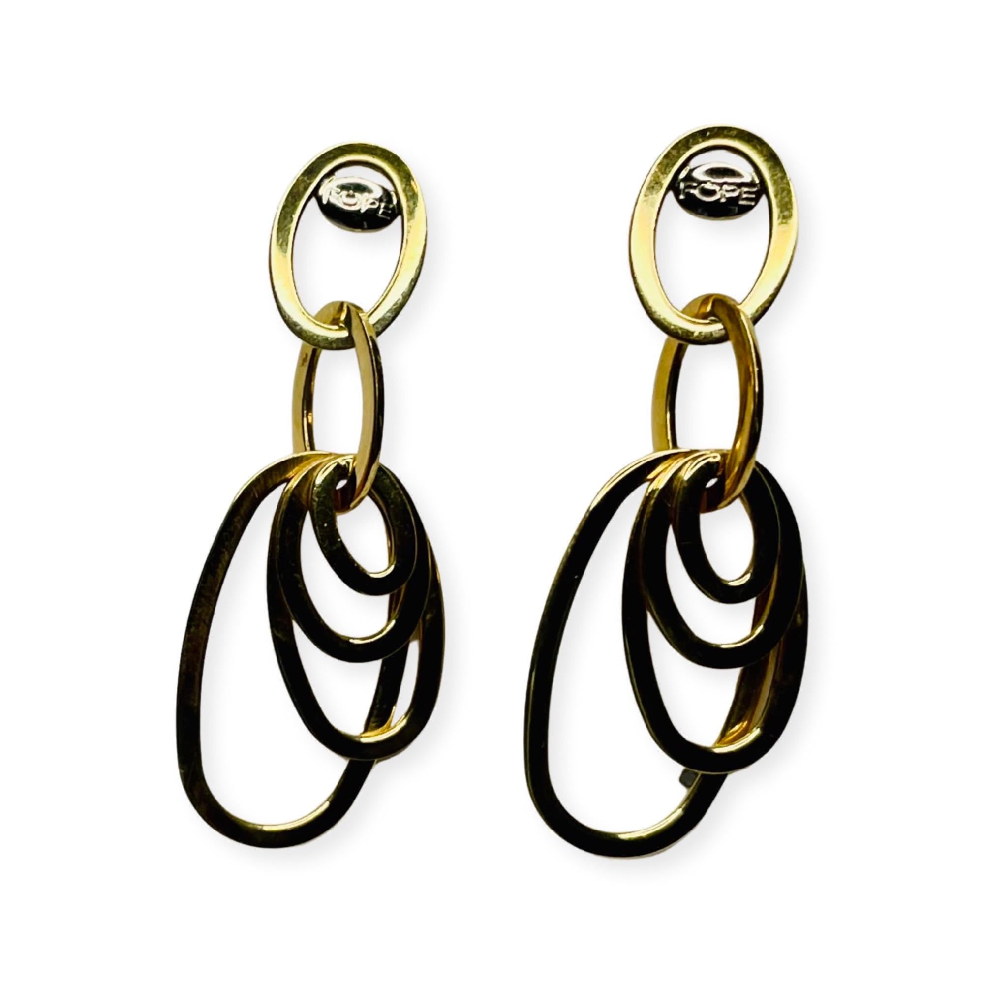 Fope 18K Yellow Gold Earrings. They are 43.0 mm in length. The largest ring is 13.9 mm in length. They have 14K yellow gold backs embedded in silicone. 400-50-469 