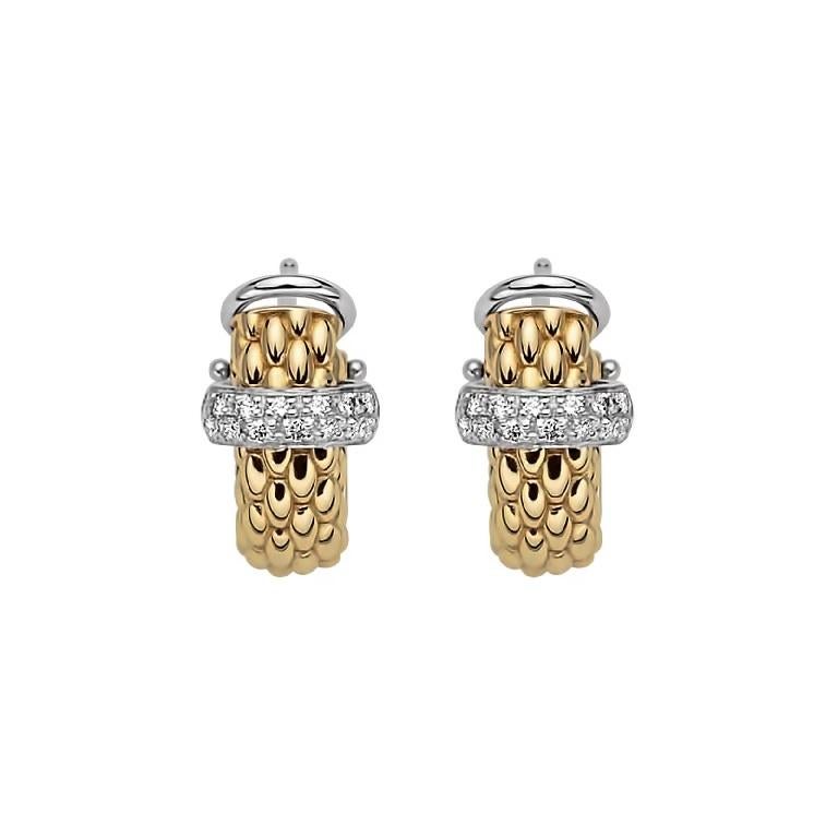From FOPE's Vendome collection, the 18 karat yellow gold huggie style hoop earrings. Both pieces feature a pave sets with round diamonds totaling 0.20 carats, with G coloring and VS1 clarity. There is omega post backs and carat weights engraved on