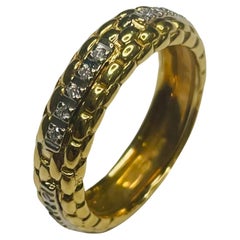 Ring "Lucrezia" aus 18 Karat Gelb- und Weißgold mit Seil und Diamant