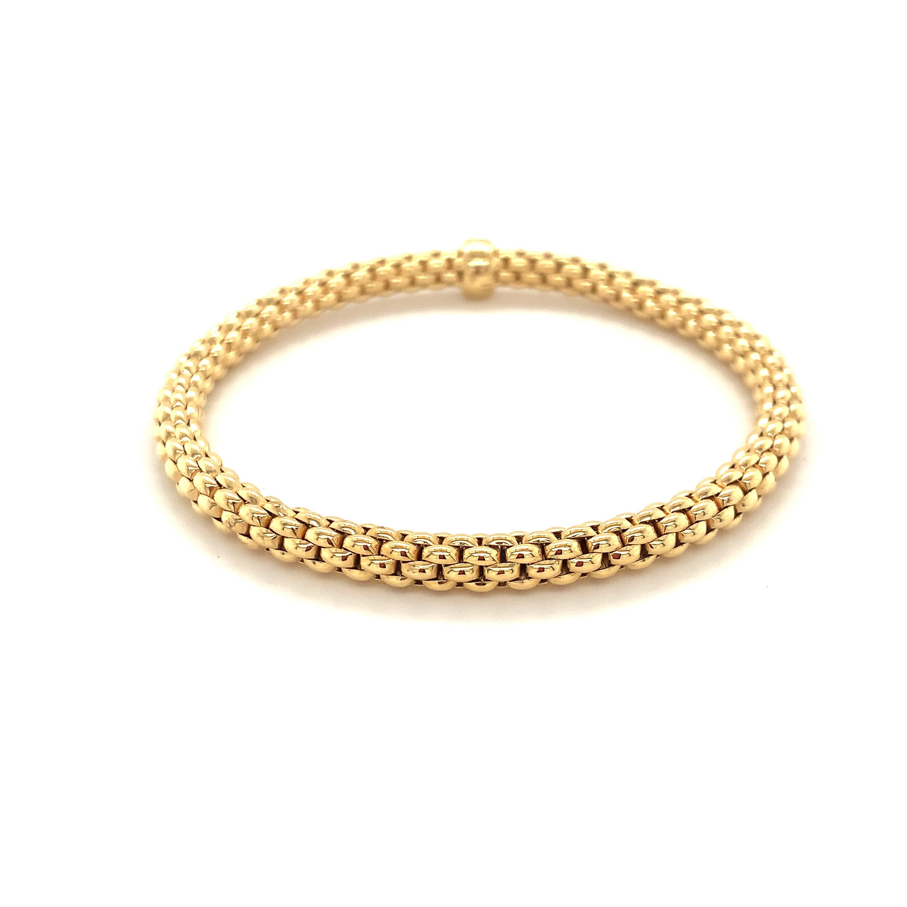 Flexible bracelet entirely made of 18 carat gold with gold rondel (no stones). This mesh chain hides dozens of tiny 18 carat gold springs which make the bracelets and rings smooth and flexible.

Stock Size: 175mm / 17cm / 6.69in
Style: