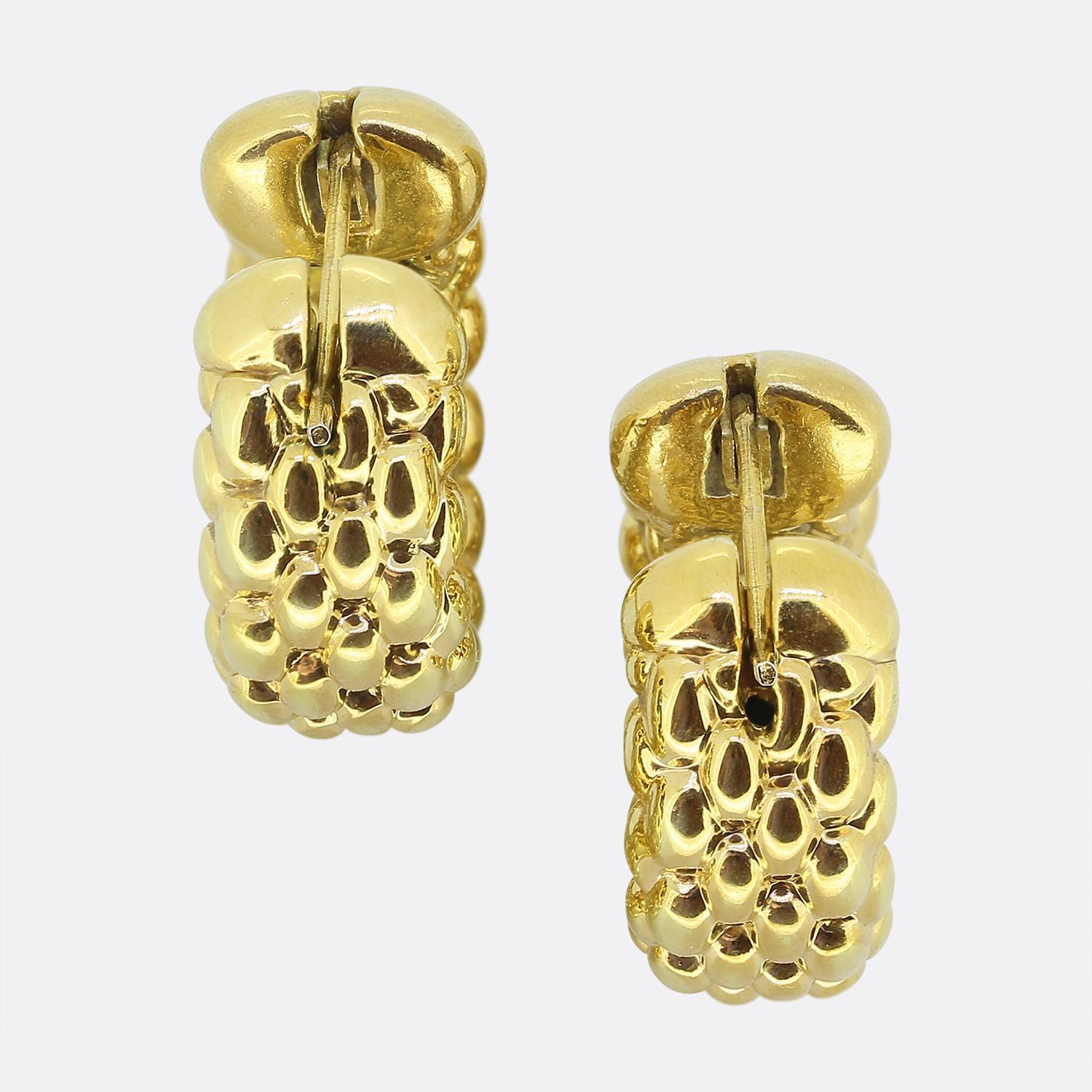 Here we have a chic and stylish pair of hooped earrings from the renowned jewellery designer, Fope. Each identical piece has been crafted from 18ct yellow gold and features a textured, interlocking design that creates a captivating, woven