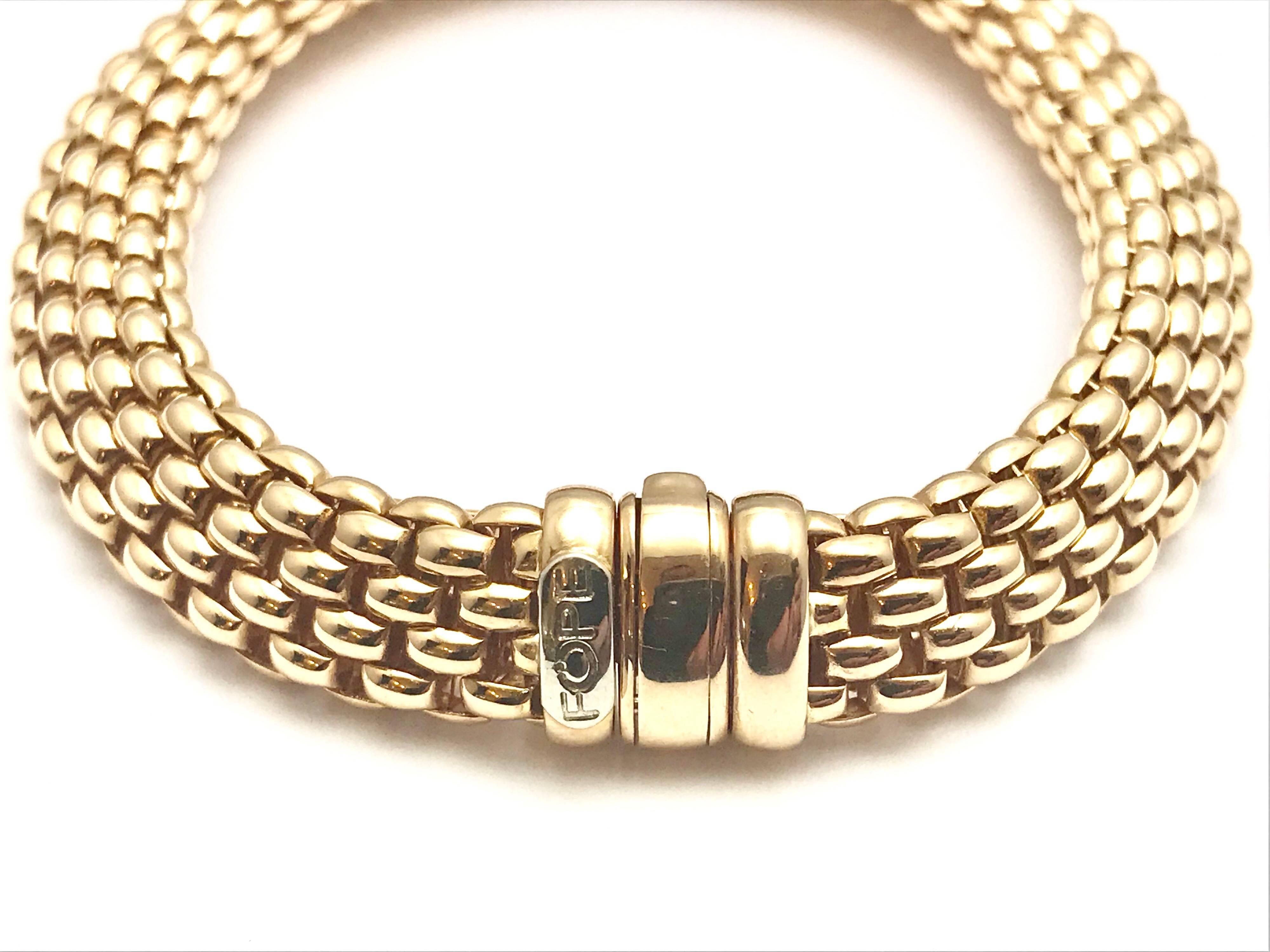 A Fope Italian designed 18 karat rose gold bracelet. The bracelet is designed with woven links, creating a very soft feel, and measures 10.00mm wide. The bracelet is 7.50 inches in length. 

Signature: FOPE
Hallmark: 750