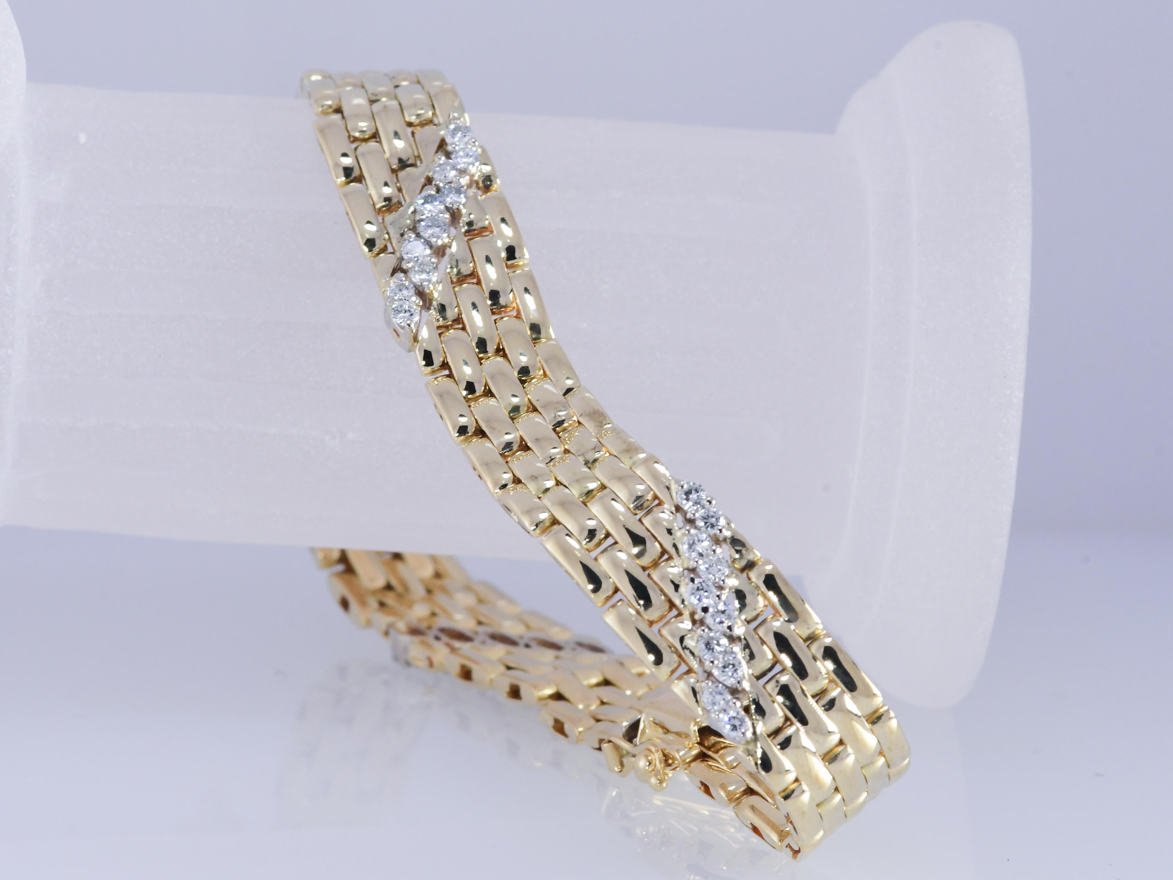 Fope jewelry based in Vicenza, Italy has been manufacturing designer 18 karat gold jewelry since 1929. This vintage five row panther link bracelet has four diagonal rows of round brilliant cut diamonds. The diamonds total 1.2 carat and are VS1-SI2;
