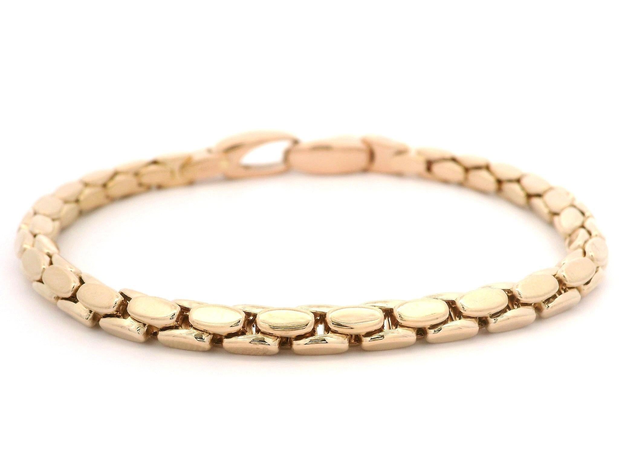 Material: 18k Solid Rose Gold
Weight: 14.64 Grams
Chain Type: Polished link
Chain Length: 7.25