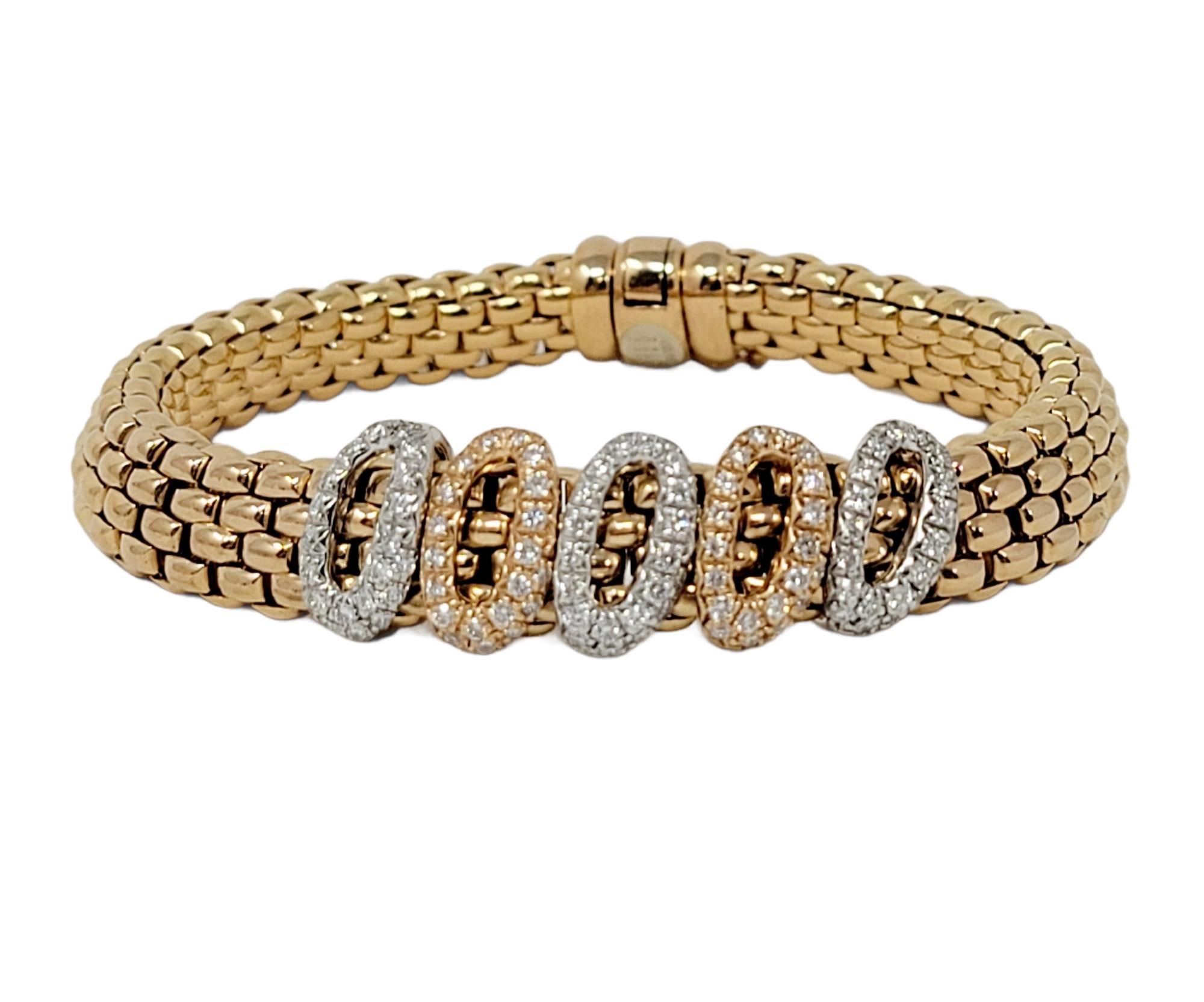 Brighten up your wrist with this gorgeous glittering pave diamond station bracelet by FOPE. Featuring 100 shimmering diamonds and a multi-tone gold setting, the flexible mesh design of this beautiful piece offers a comfortable elegance that sparkles