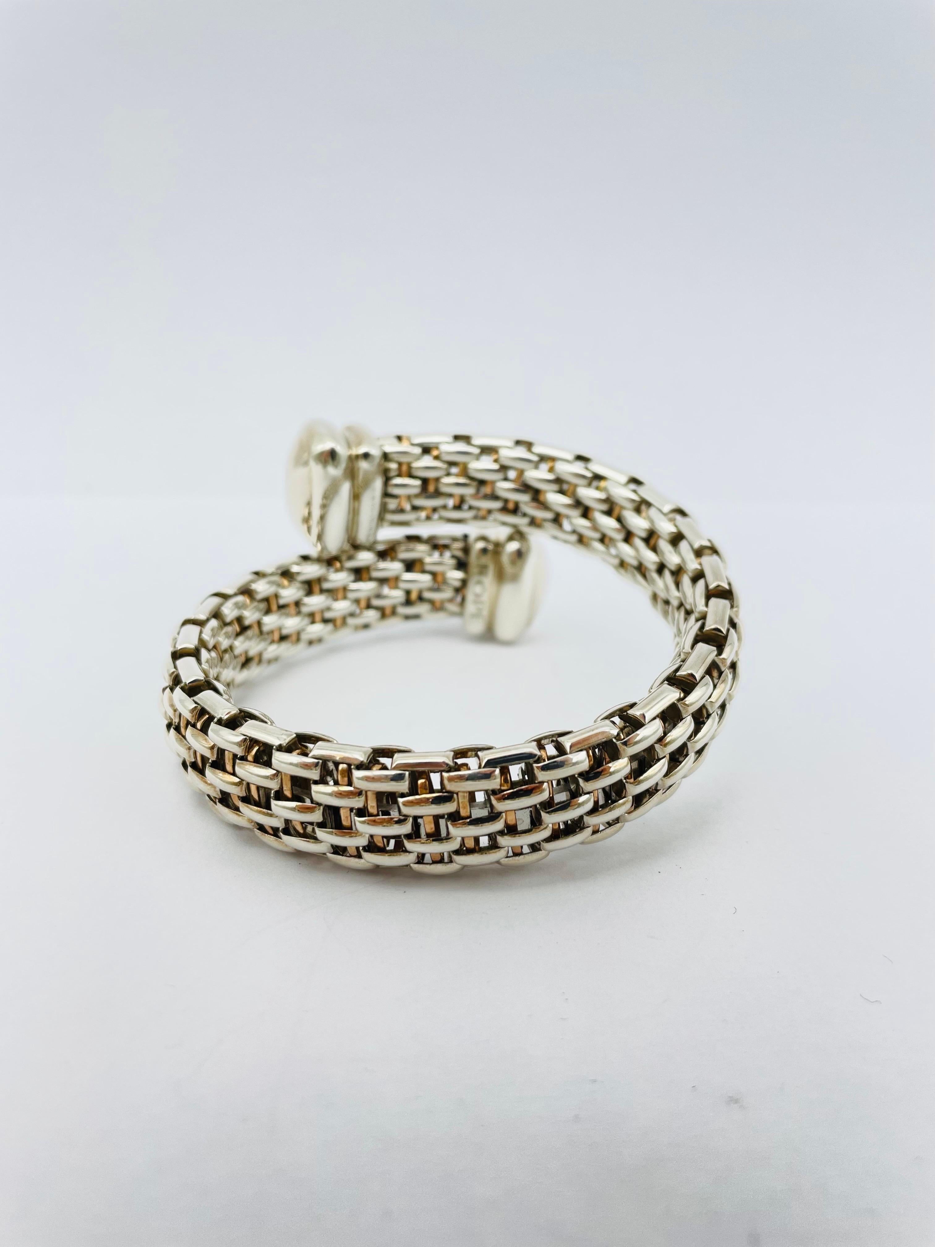 FOPE Novecento Silver Braclet/Bangle, 0.16ct diamond
Silver 925 bangle
Model: Novecento
Rhodium plated to prevent tarnishing
Original packaging included

original certificate included from 07.12.2015

Excellent condition
