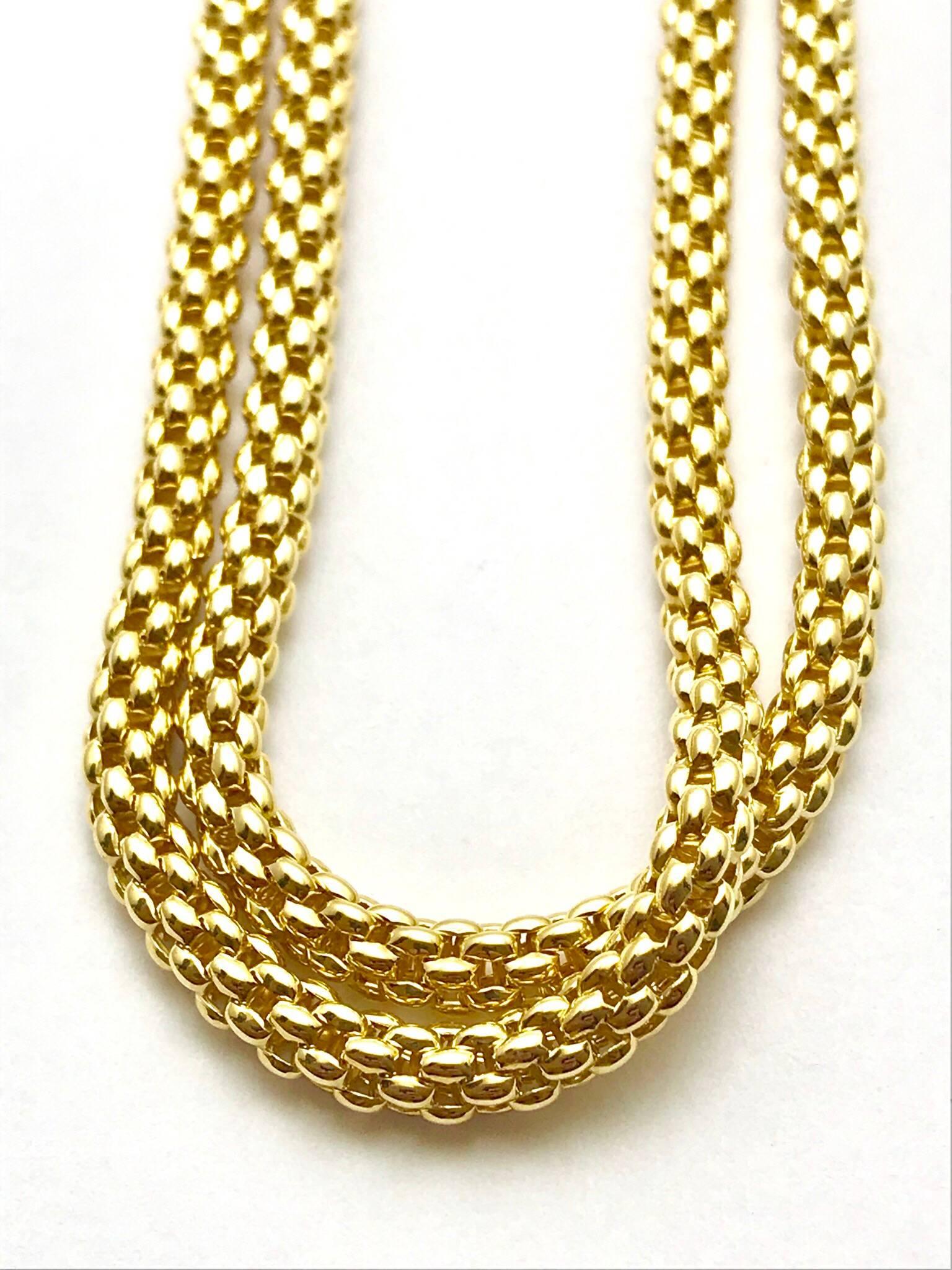 Fope Vendome 39.00 inch 18 karat woven yellow gold Italian made necklace.  Each individual link is slightly curved, creating an ultra soft feel.  The necklace can easily be worn long or doubled up.  This necklace also nests with a rose and white