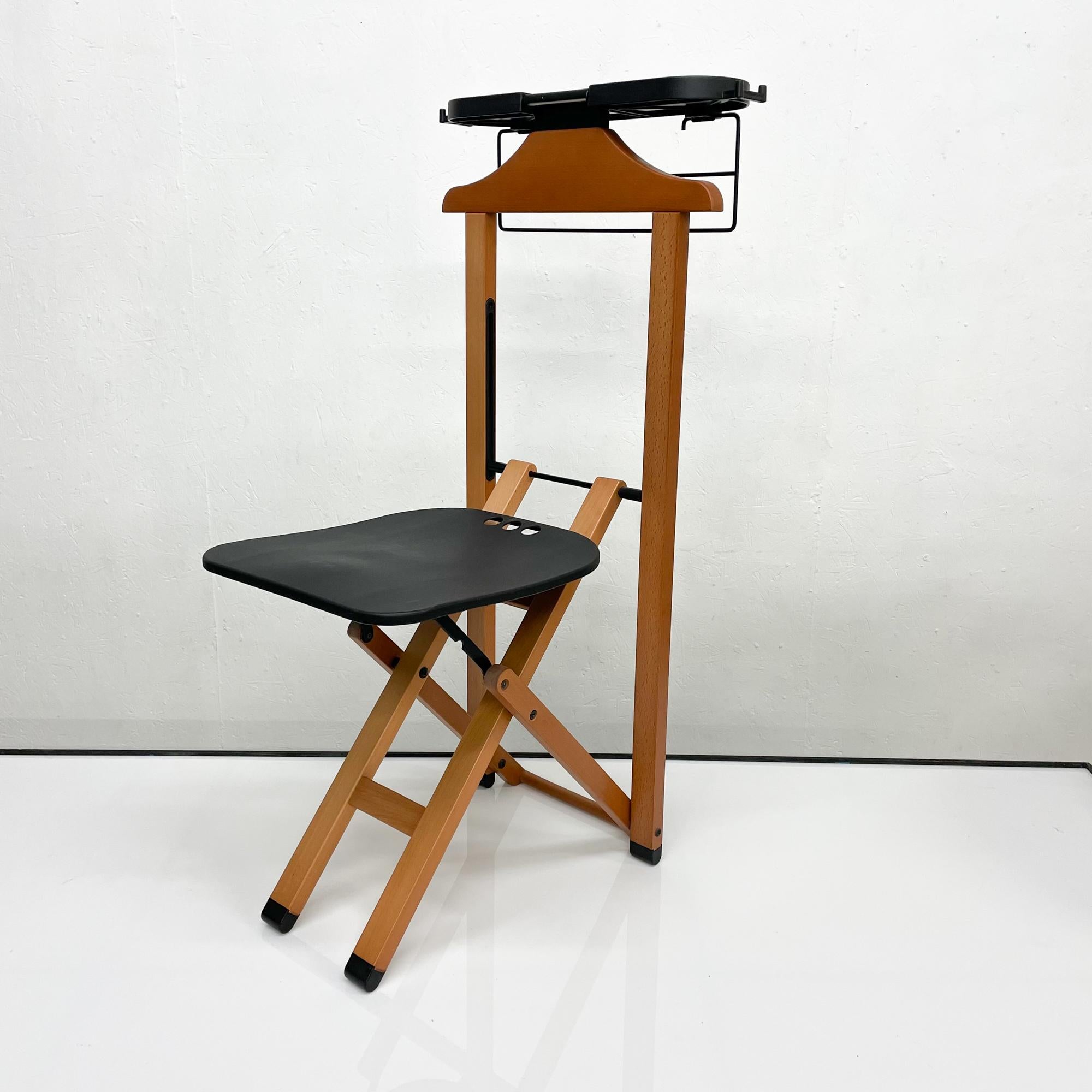 Valet Stand
Modern Italy Foppapedretti Gentleman's Folding Valet with Chair.
Amazing design with a chair and valet included. The chair can be folded into a very practical rectangular shape which takes up hardly any space. 
Very good vintage