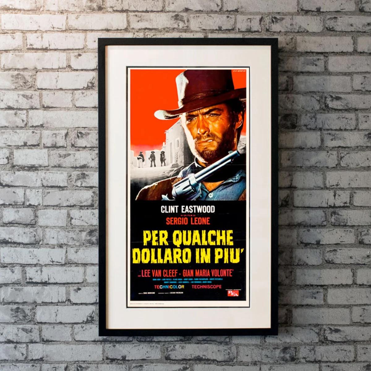 Per qualche dollaro in più (1966)
Locandina originale italiana (13 x 28 pollici)

Il sequel di Un pugno di dollari di Sergio Leone riunisce il regista italiano con Clint Eastwood, il famigerato 