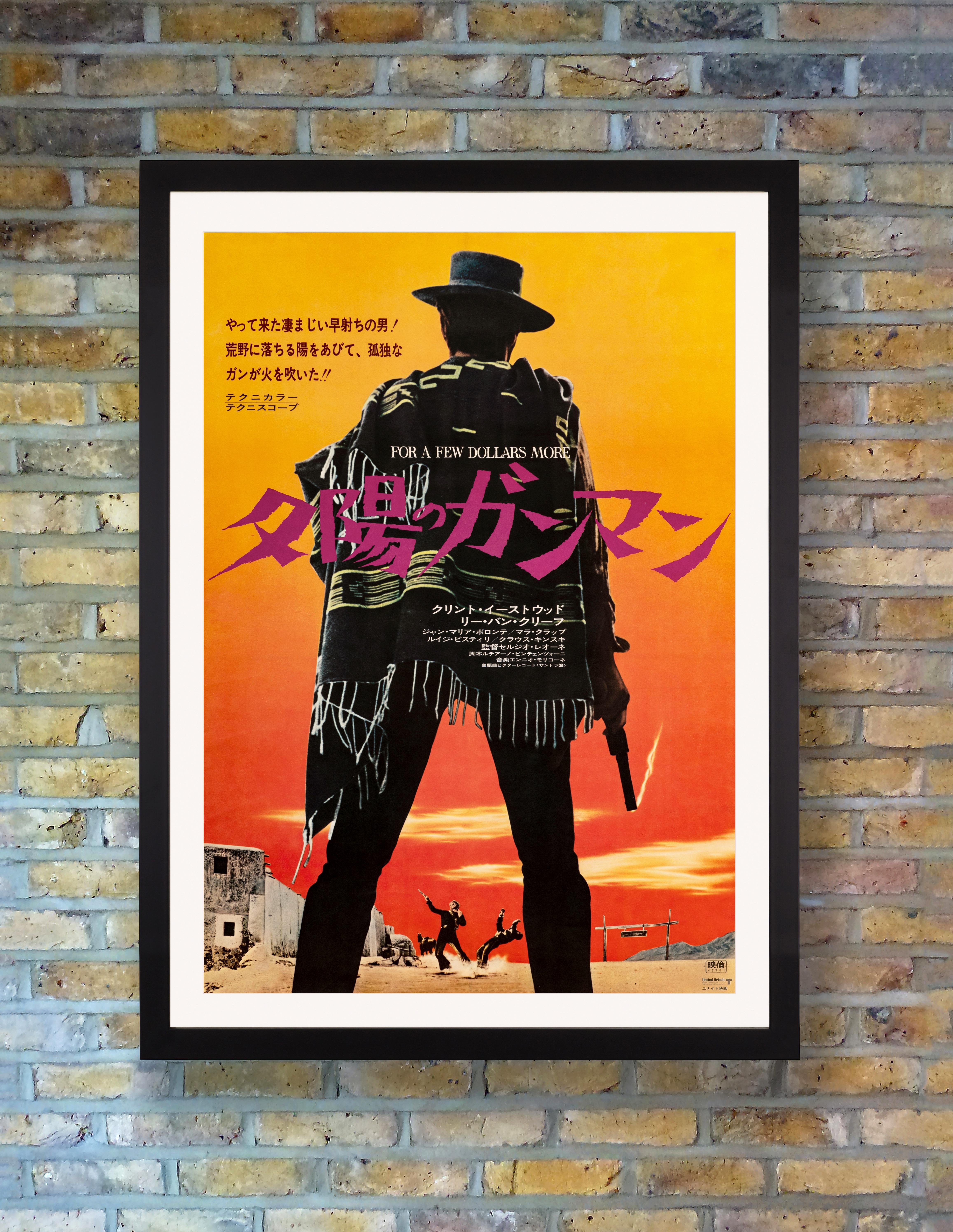 With smoking gun and steadfast stance, Clint Eastwood's silhouette punctuates the striking sunset design of this sought after B2 poster for the 1972 Japanese re-release of Sergio's Leone's 1965 Spaghetti Western sequel 'For A Few Dollars More.'