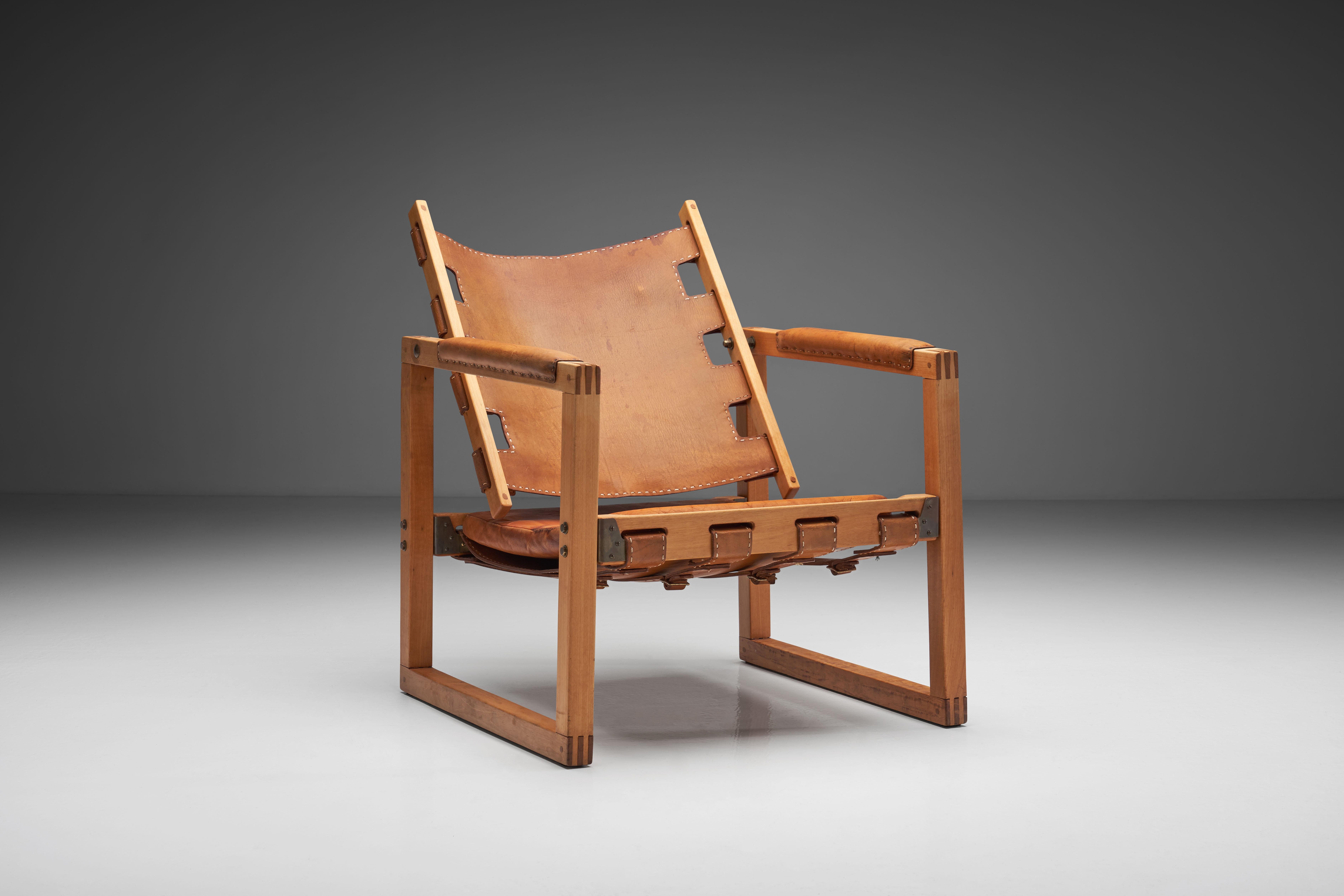 Designed by Danish designer Peder Hansen, who immigrated to New Zealand in the 1960s, this safari chair in cognac leather and eucalyptus frame was produced by Taraire Crafts in Auckland, New Zealand 1967.

The chair has an elementary structure