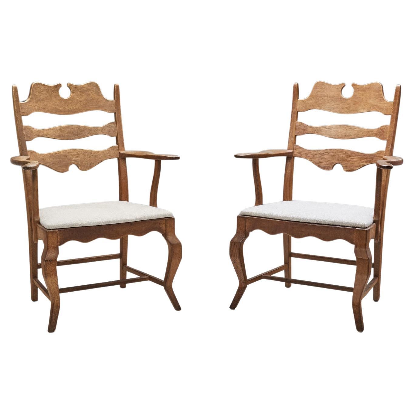 Für Lauren Ashley - Ein Paar Henning Kjærnulf Ein Paar Oak Dining Chairs.