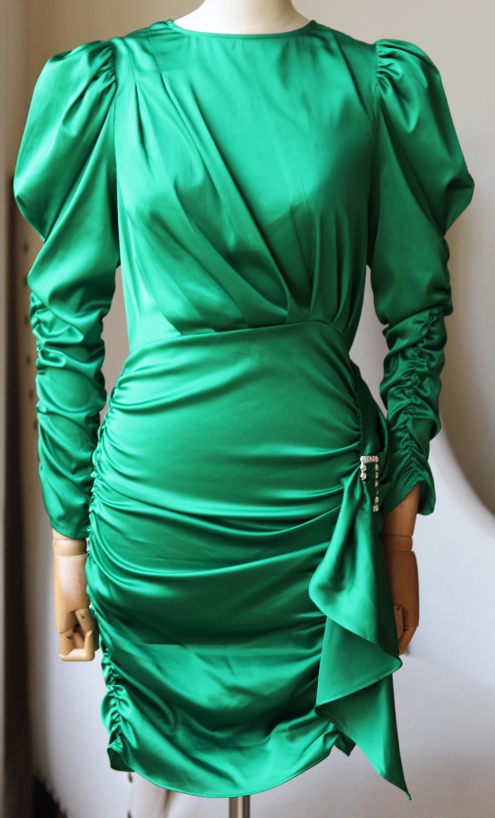 For Love and Lemons 'Isabeli' dress is made from satin, this mini dress turns to reveal an open back and has a ruching and crystal embellishments along the skirt. 
Green satin. 
Button fastening along back, concealed zip fastening along back. 
92%