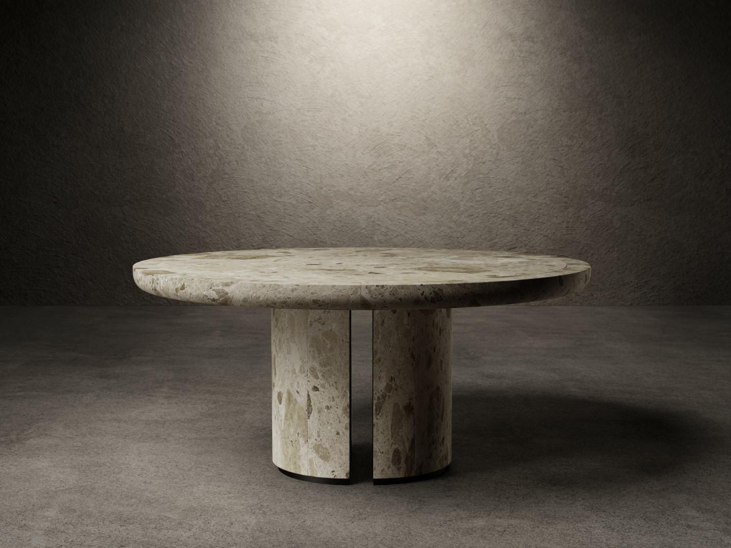 La table de salle à manger For No One a un plateau composé d'une dalle de marbre Ambrosia mat soutenue avec un cadre de 8 cm en marbre massif.
Le plateau est ancré aux deux bases par des plaques de métal noir mat. Chaque base est composée de deux
