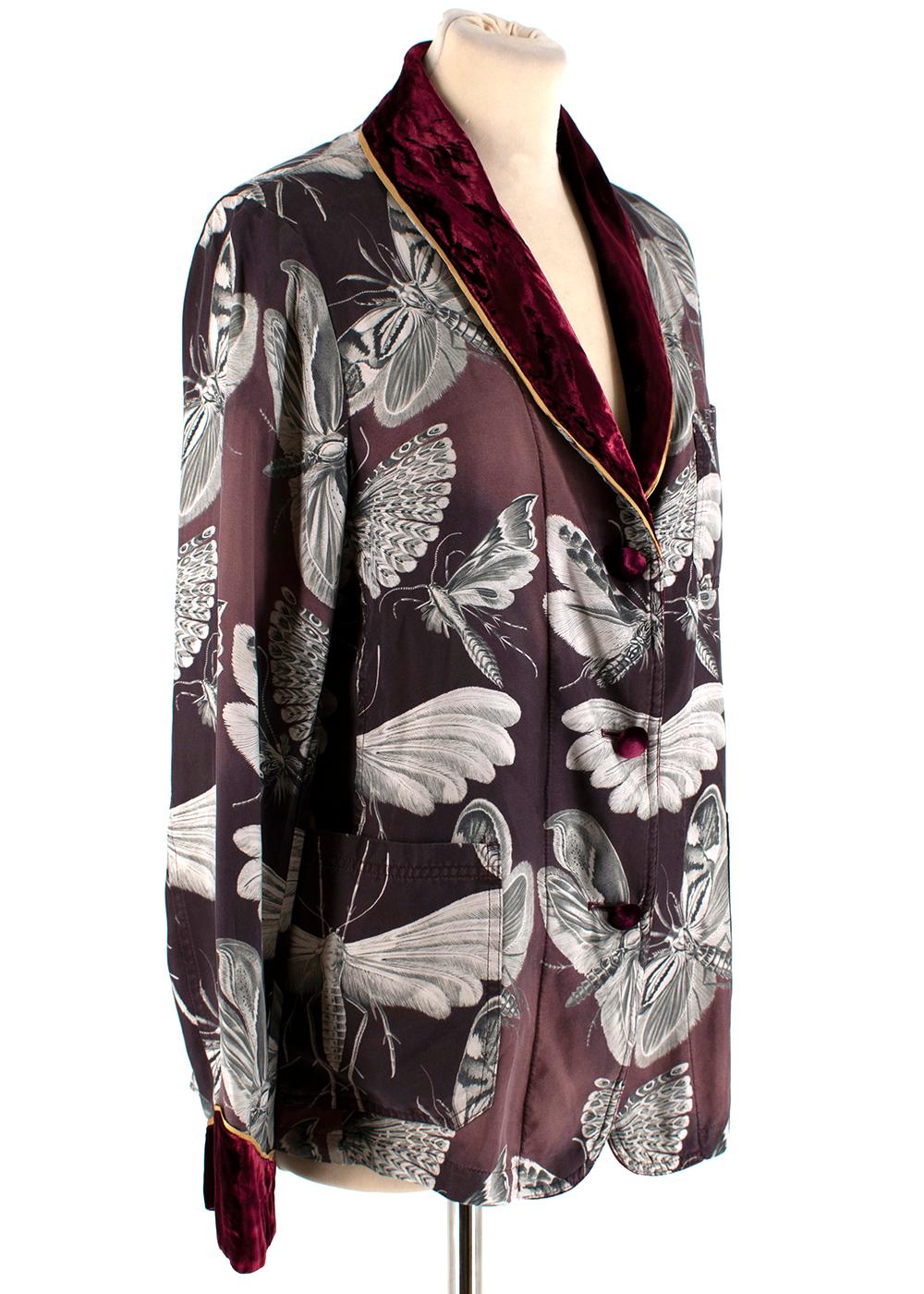 For Restless Sleepers Burgundy Silk Insect 

- Tailored shirt and trouser set 
- Soft lightweight silk 
- Burgundy floral print 
- Velvet lapel and covered button fastening
- Straight leg with pressed creases and front button fastening 
- Gold trim