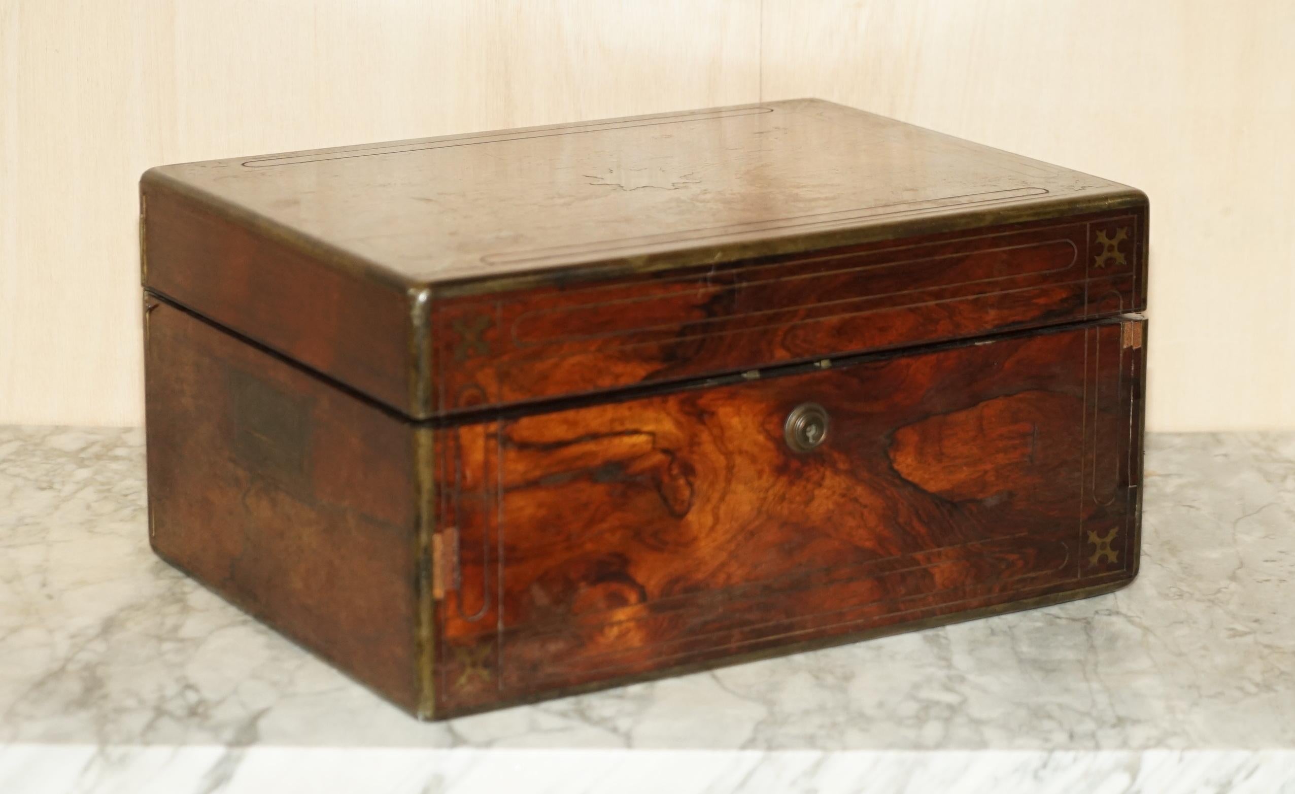 We are delighted to offer for sale this lovely and very rare Regency circa 1810 Rosewood with brass inlay Vanity box with sterling silver jars and contents in need of restoration.

A very collectable and rare piece, the case is in need of