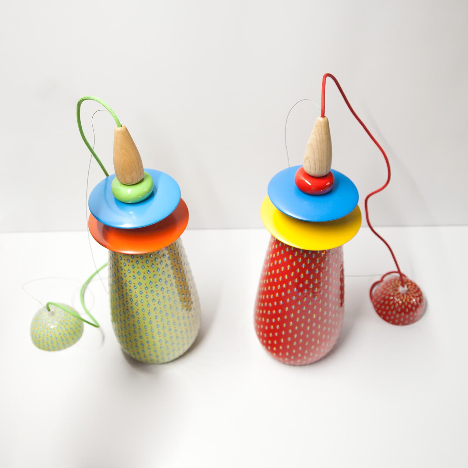 Swedish design duo Glimpt designed these strawberry-inspired pendant lamps in 2010. Called Forbidden Fruit, the collection of lights feature ceramic shades that have been painted with tiny details representing strawberry pips. The cords are fitted
