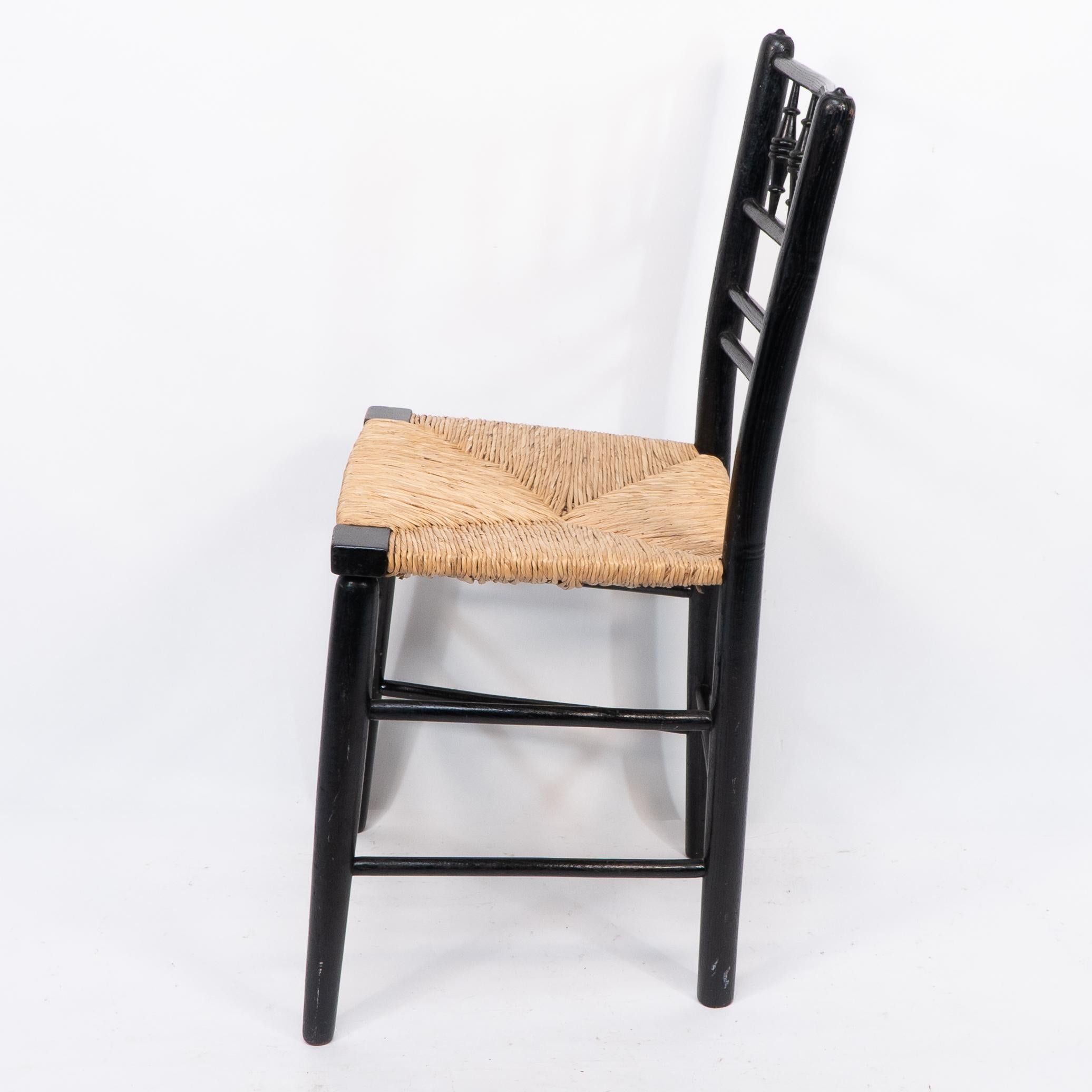 Late 19th Century Morris & Co attr to Philip Webb. Aesthetic Movement pair rush seat Sussex chairs For Sale