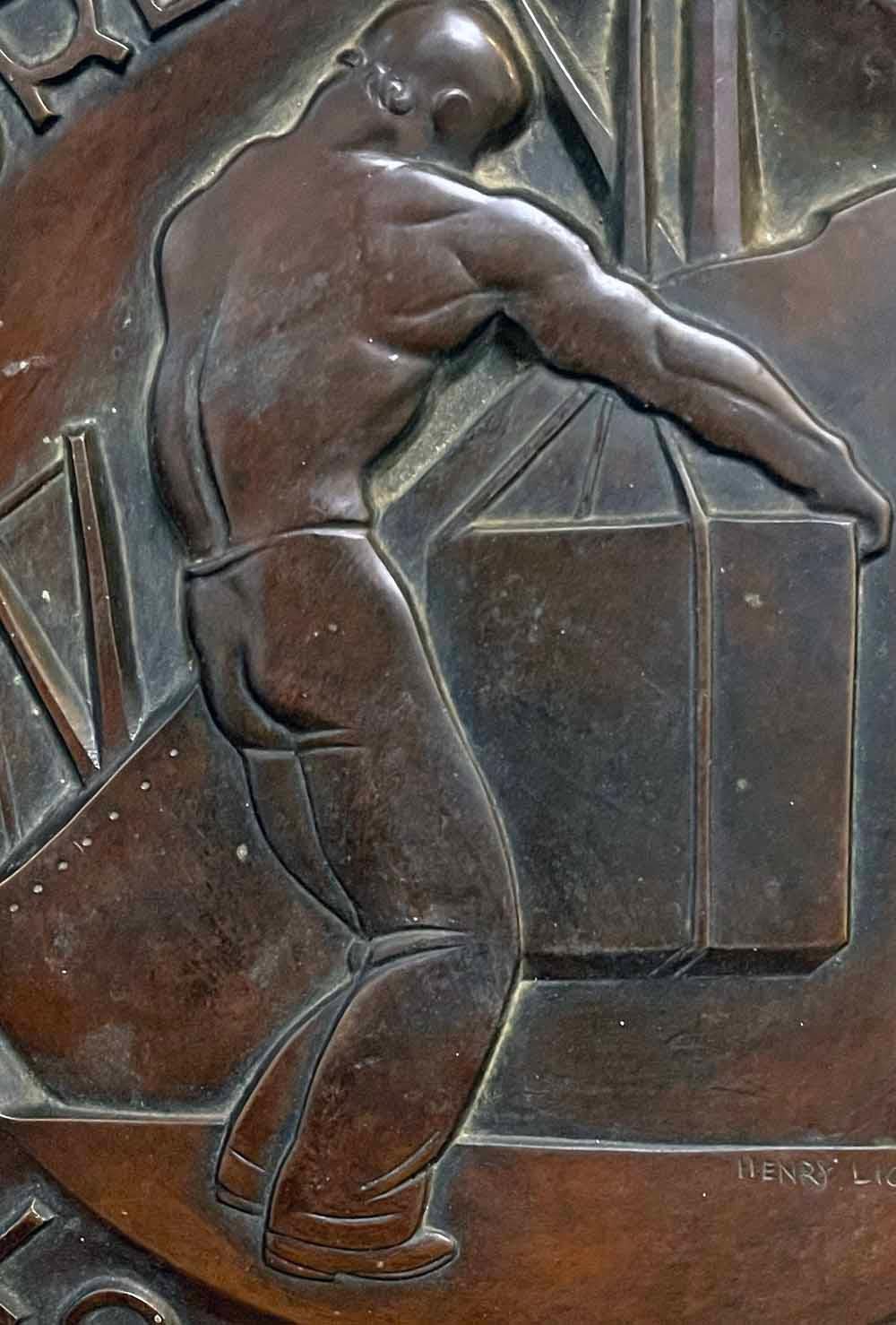 A superb and unique example of the Art Deco sculpture of Henry Lion -- who created some of Los Angeles' most important public works in the heyday of its growth in the 1920s and 30s -- this bronze rondel depicts a shirtless stevedore maneuvering a