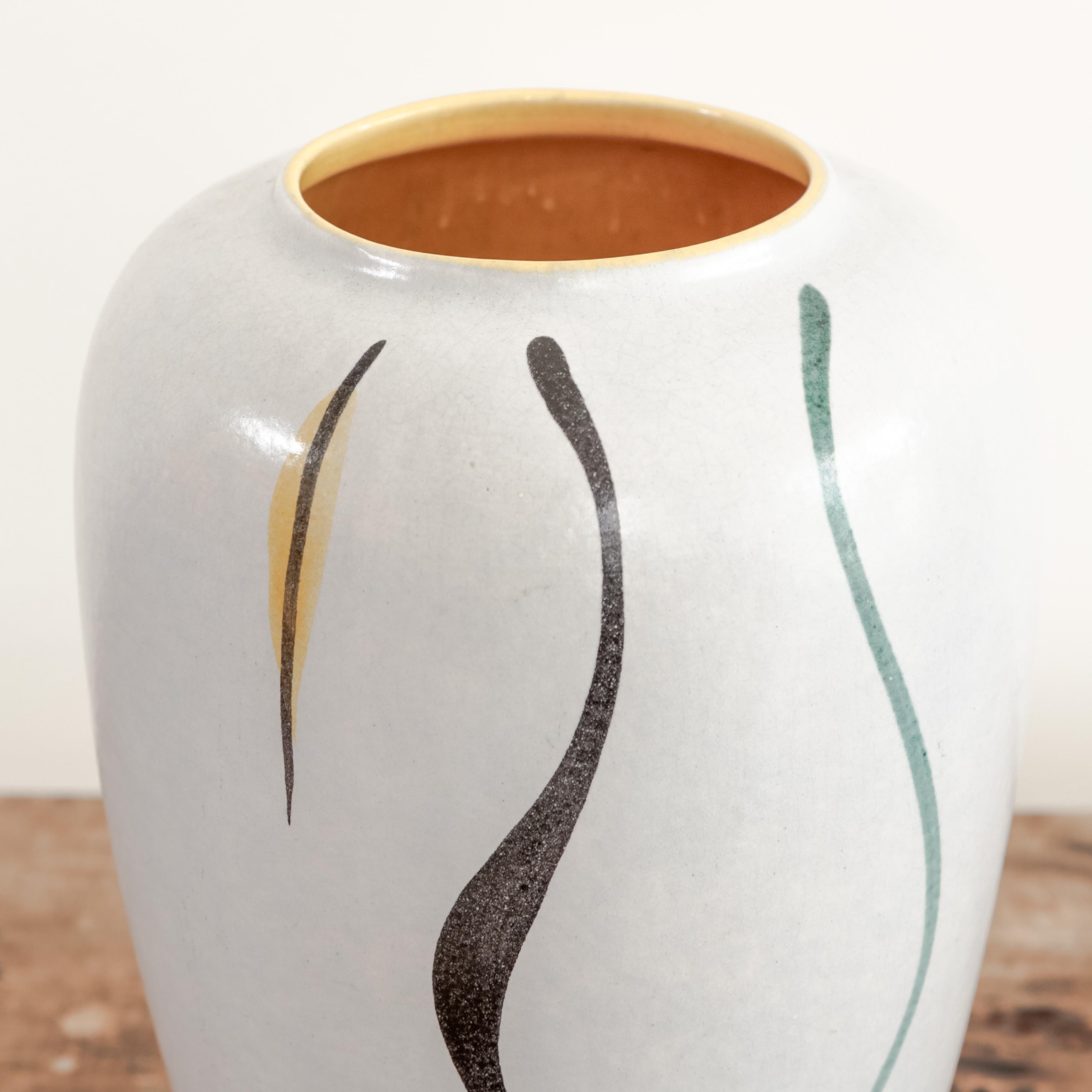 Soft blue ceramic vase 239 30 by Foreign, with brush stroke motifs and yellow glazed interior, West Germany circa 1970's.