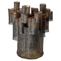 Forest, a steel & gold large textured & perforated sculpture by Claire Malet