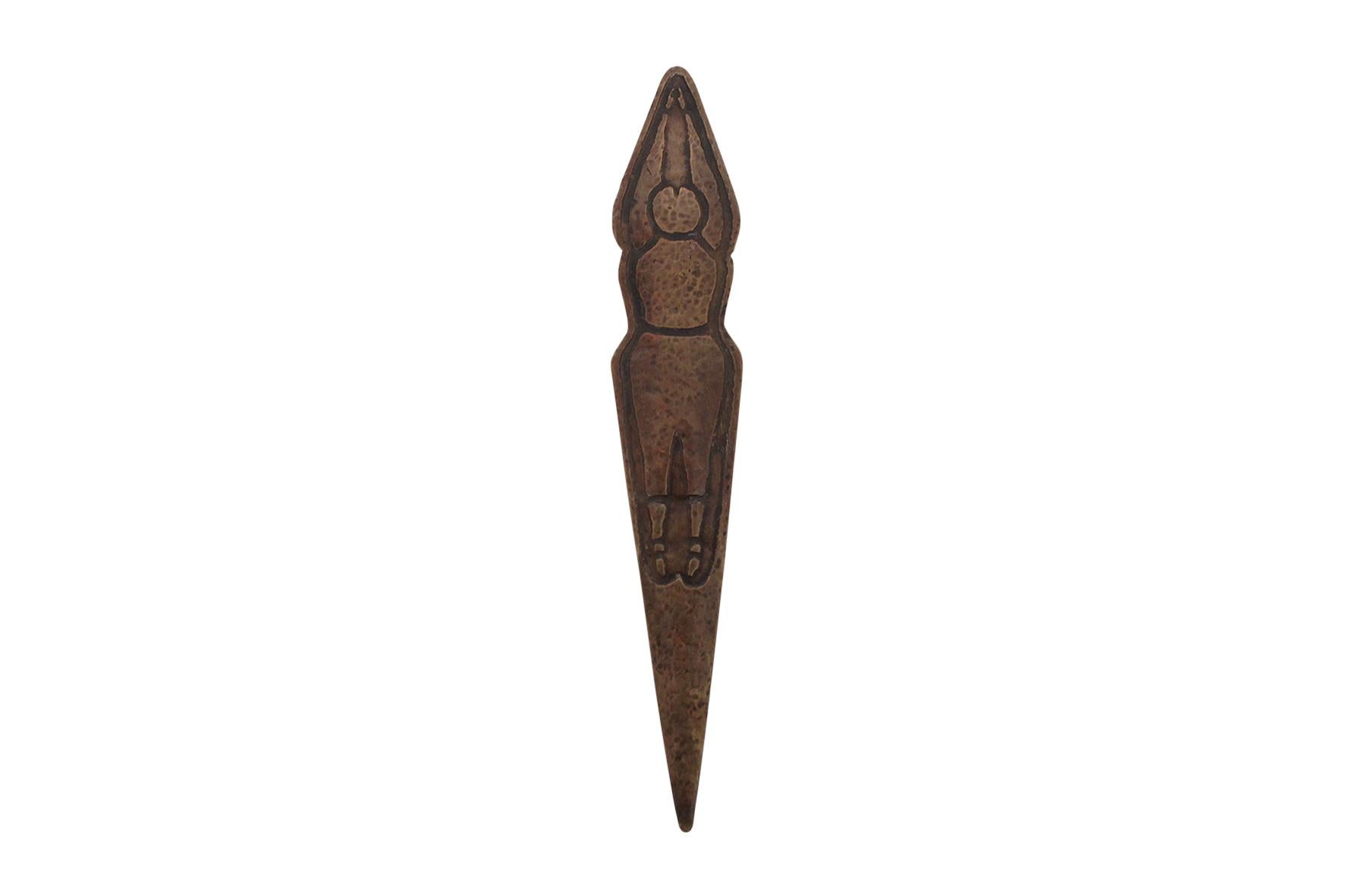 Thirties Arts & Crafts era hammered copper letter opener with a stylized swimmer in relief by Forest Craft Guild. The Guild was known for its artful and light hearted design motifs on expertly crafted objects.

____

We're offering our customers