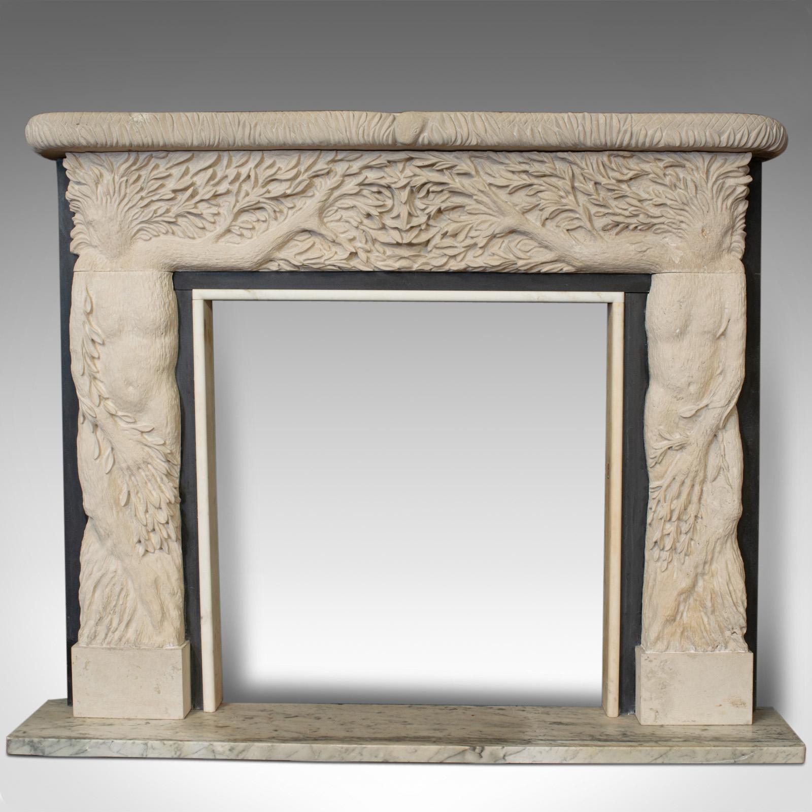 'Ladies of the Forest' is a decorative fire surround and mantelpiece. An English, Portland stone and statuary slate fireplace dating to the 20th century and by renowned sculptural artist Dominic Hurley.

One-of-a-kind decorative fire surround of