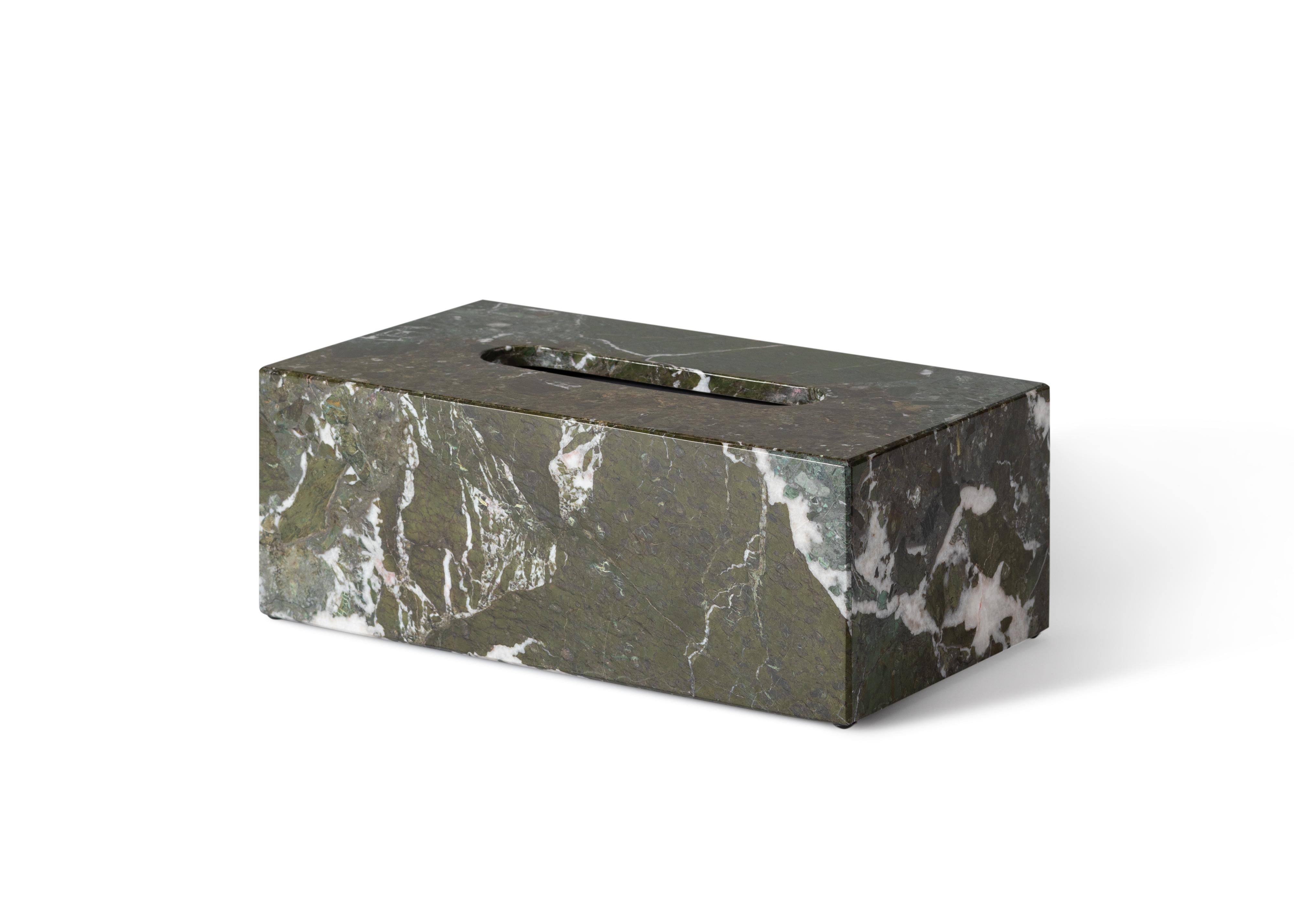 Crafted entirely by hand, this marble tissue box cover is a fusion of form and function, seamlessly blending into any space while adding sophistication and elegance. Clean, minimalist lines highlight the natural veining of the marble, making each