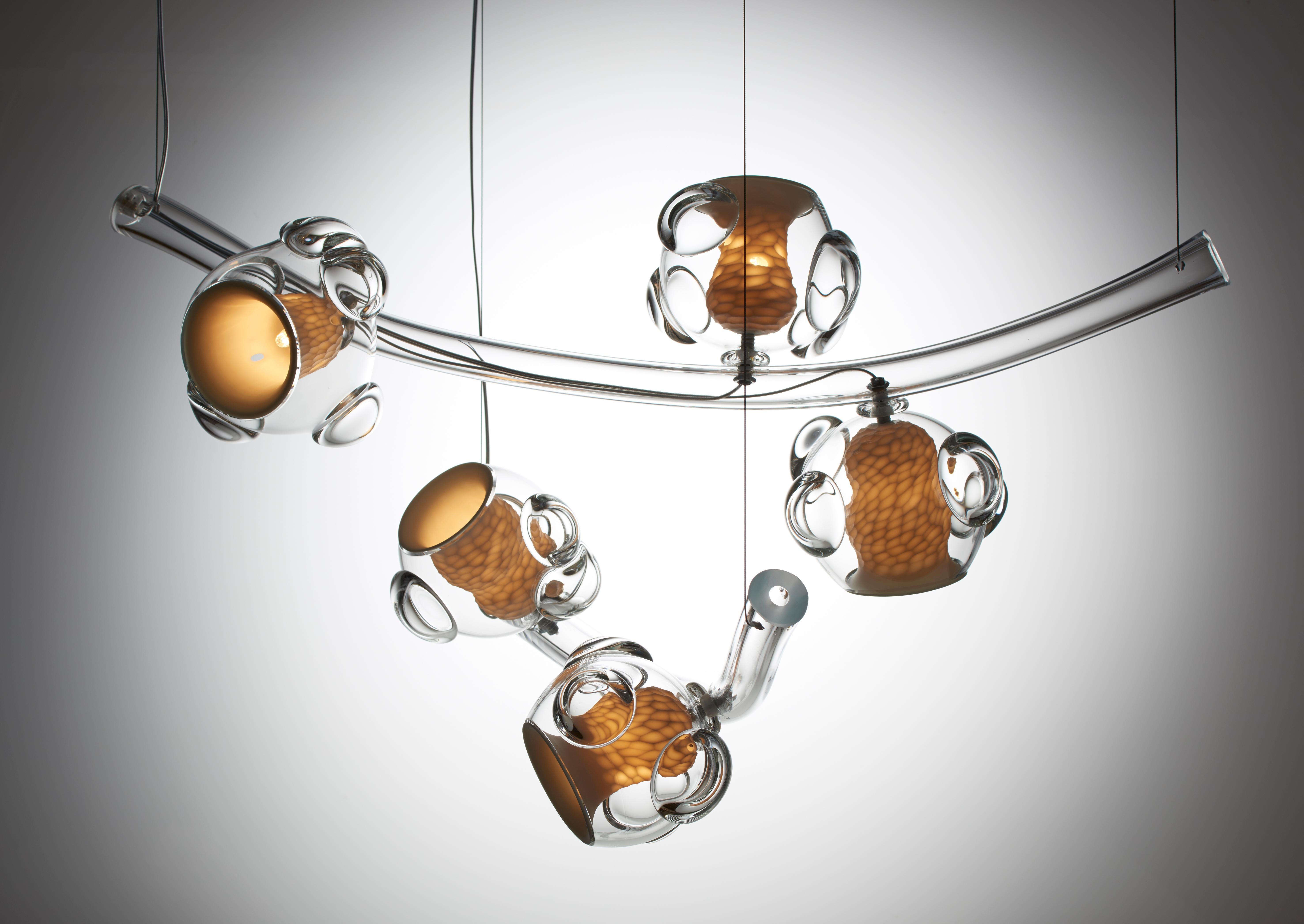 Forest of light chandelier by Vezzini & Chen
Dimensions: D70 x W30 X H55 cm
Materials: Porcelain, glass, brushed stainless steel fitting, stainless steel , clear 2 core cable , LED G9 light bulb.
Also Available: Composition and number of lights