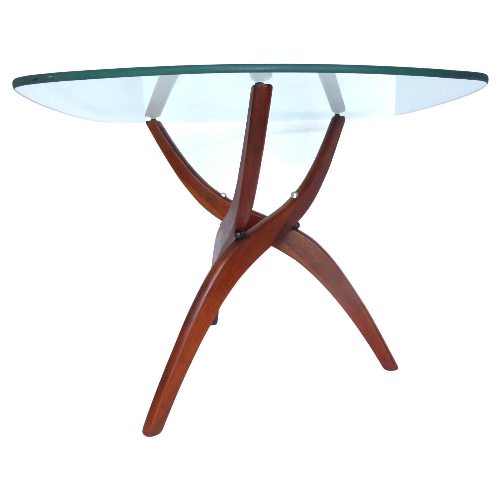  Organic Modern Side Table with glass top and solid walnut base by Forest Wilson. Inspired by the designs of Adrian Pearsall, fluid form of the three solid walnut legs are joined together by decorative aluminum fastener on top and a small round ball