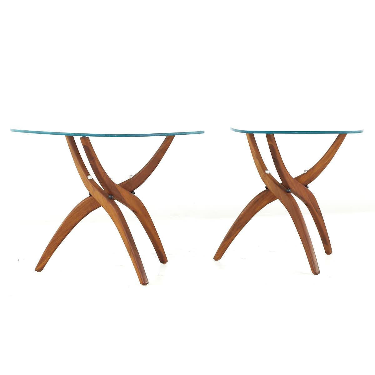 Forest Wilson Mid Century Walnut Side Tables – Pair

Each side table measures: 27 wide x 19.75 deep x 20.75 inches high

All pieces of furniture can be had in what we call restored vintage condition. That means the piece is restored upon purchase so