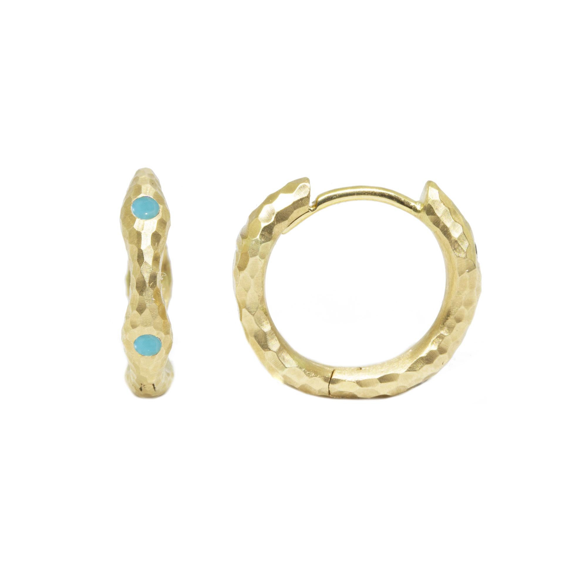 Turquoise for day, emerald for a night out: We designed a version of popular petite hoop that’s completely reversible. Each style comes with two types of gemstones—one set faces out, and you just flip the hoop around for a completely different look.