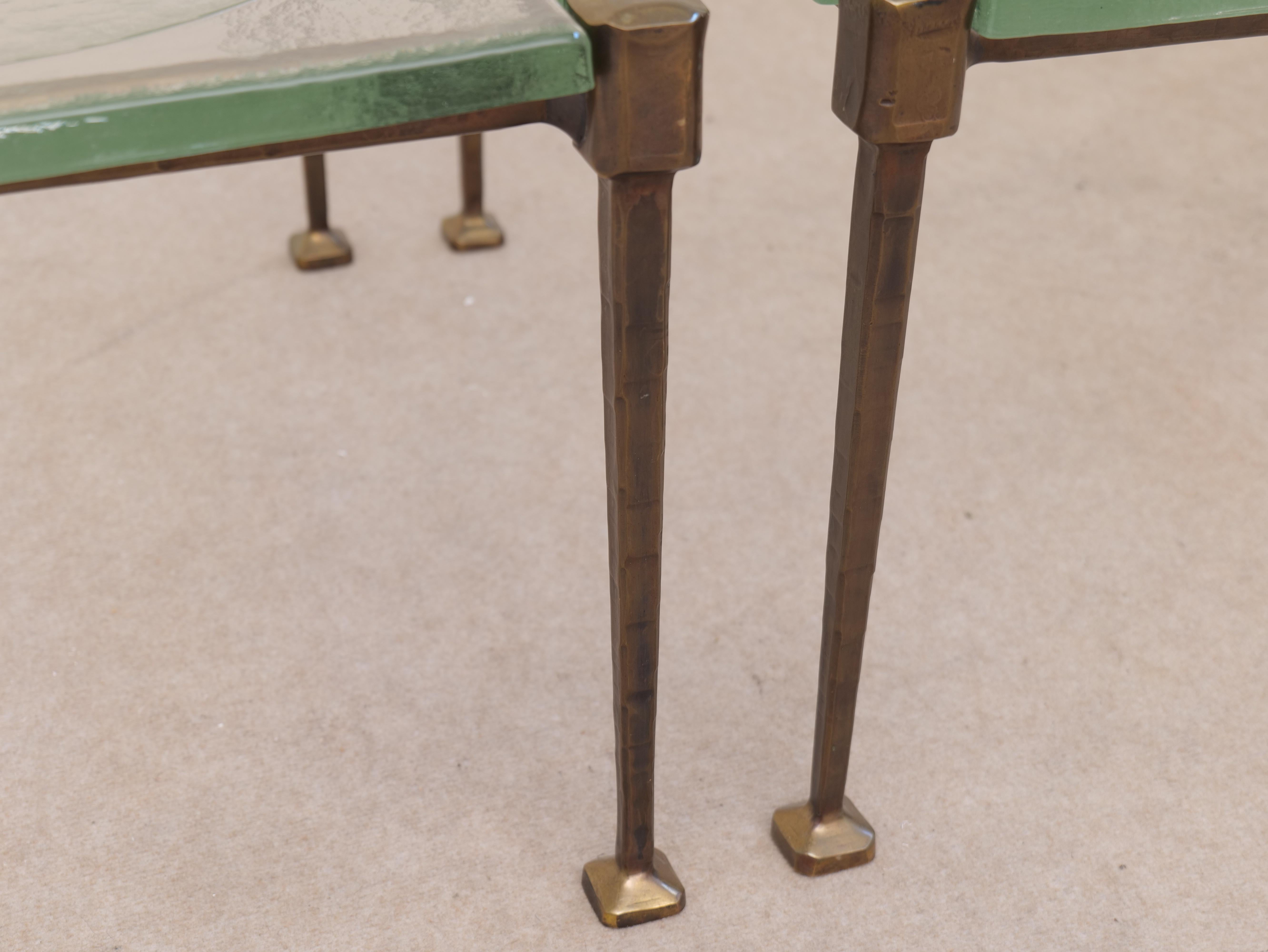 Late 20th Century forged bronze coffee tables by Lothar Kute with green glass For Sale