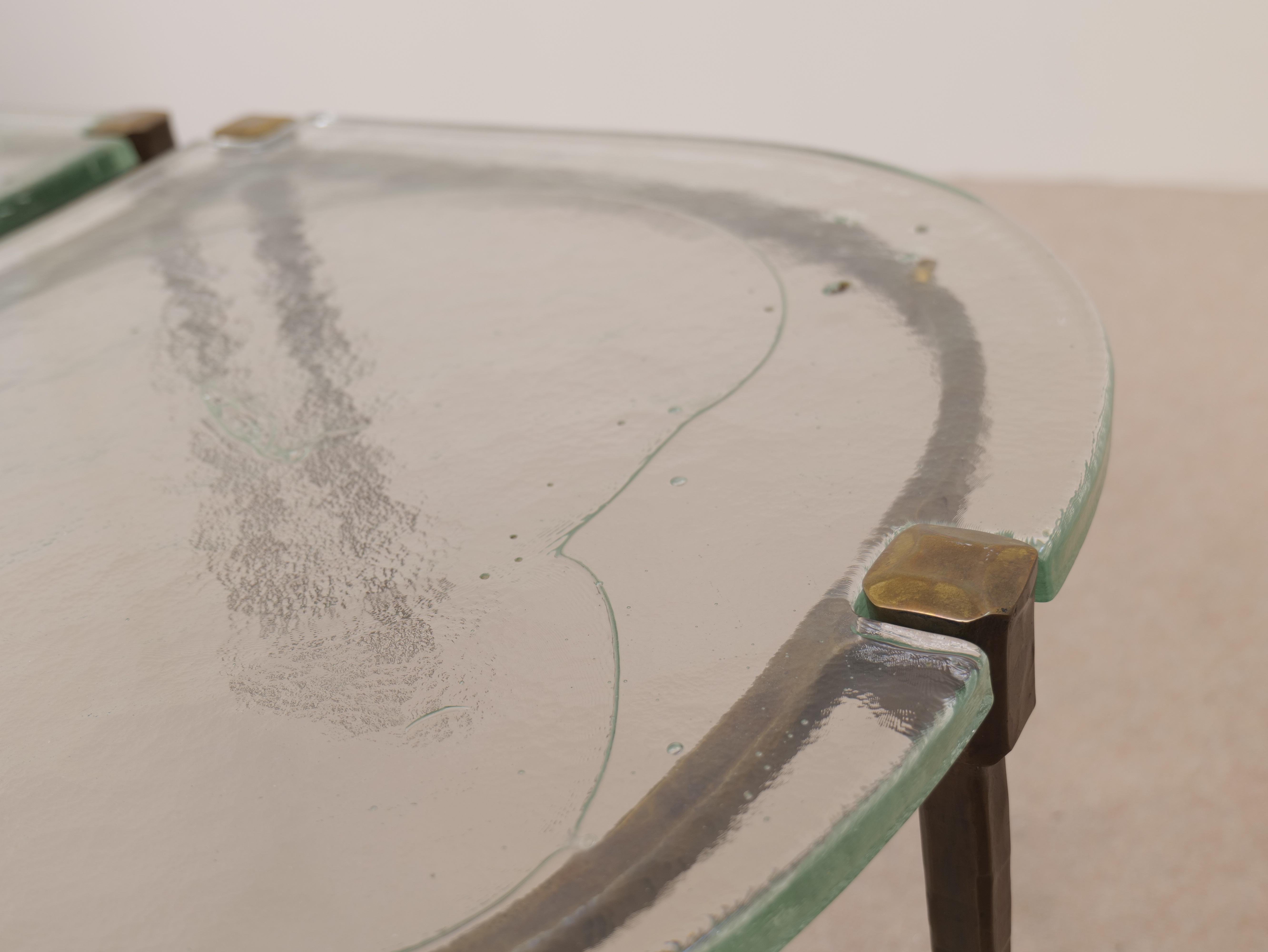 Bronze forged bronze coffee tables by Lothar Kute with green glass For Sale