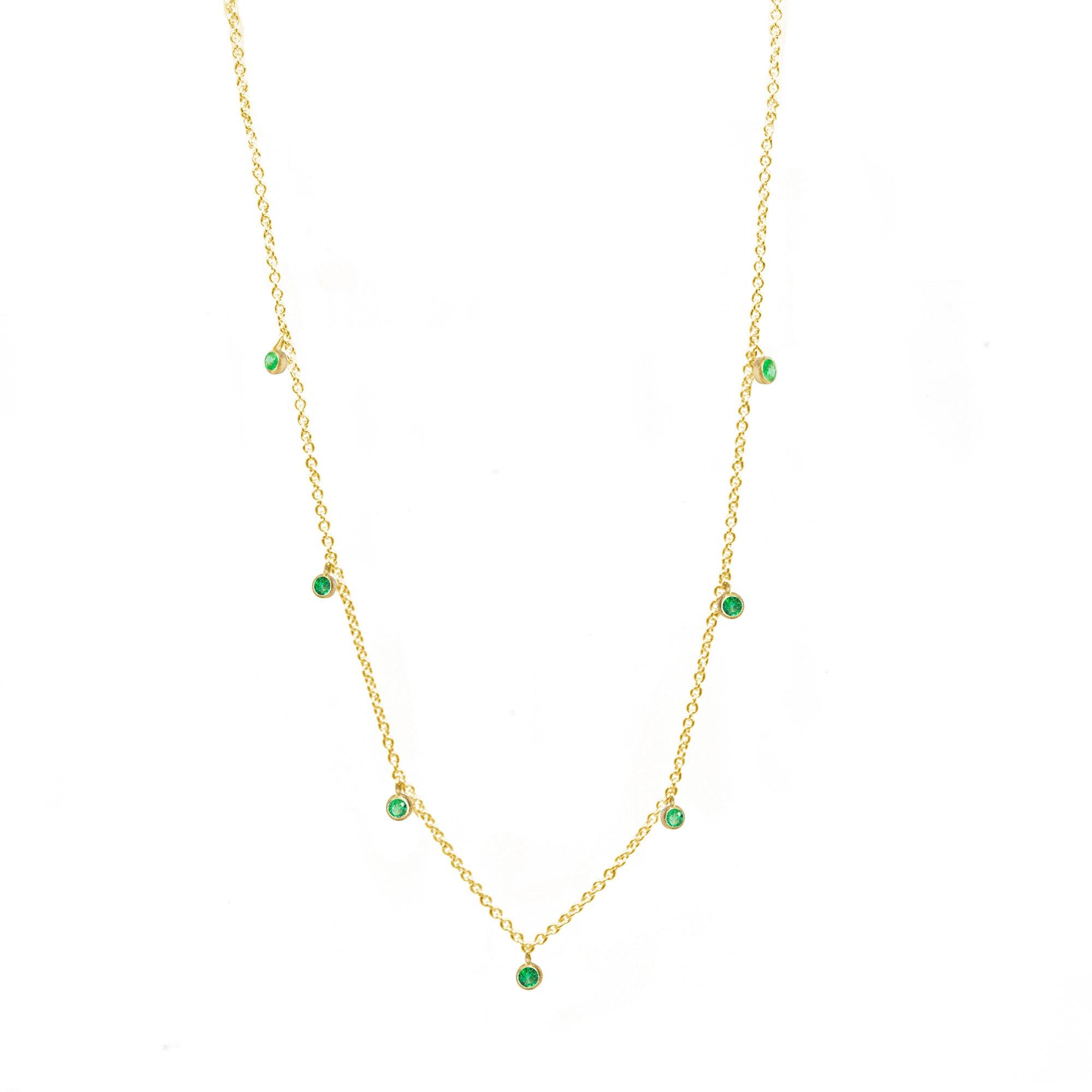 Made with emerald gemstone rimmed in gold, our Forged Gold Necklace provides an effortless, yet fashionable style.

Details
Necklace Information

Metal: 18K Gold
Length: 15-17''
Gemstone Information

Stone Size: 2.5mm
Total Carat Weight: 0.75
About